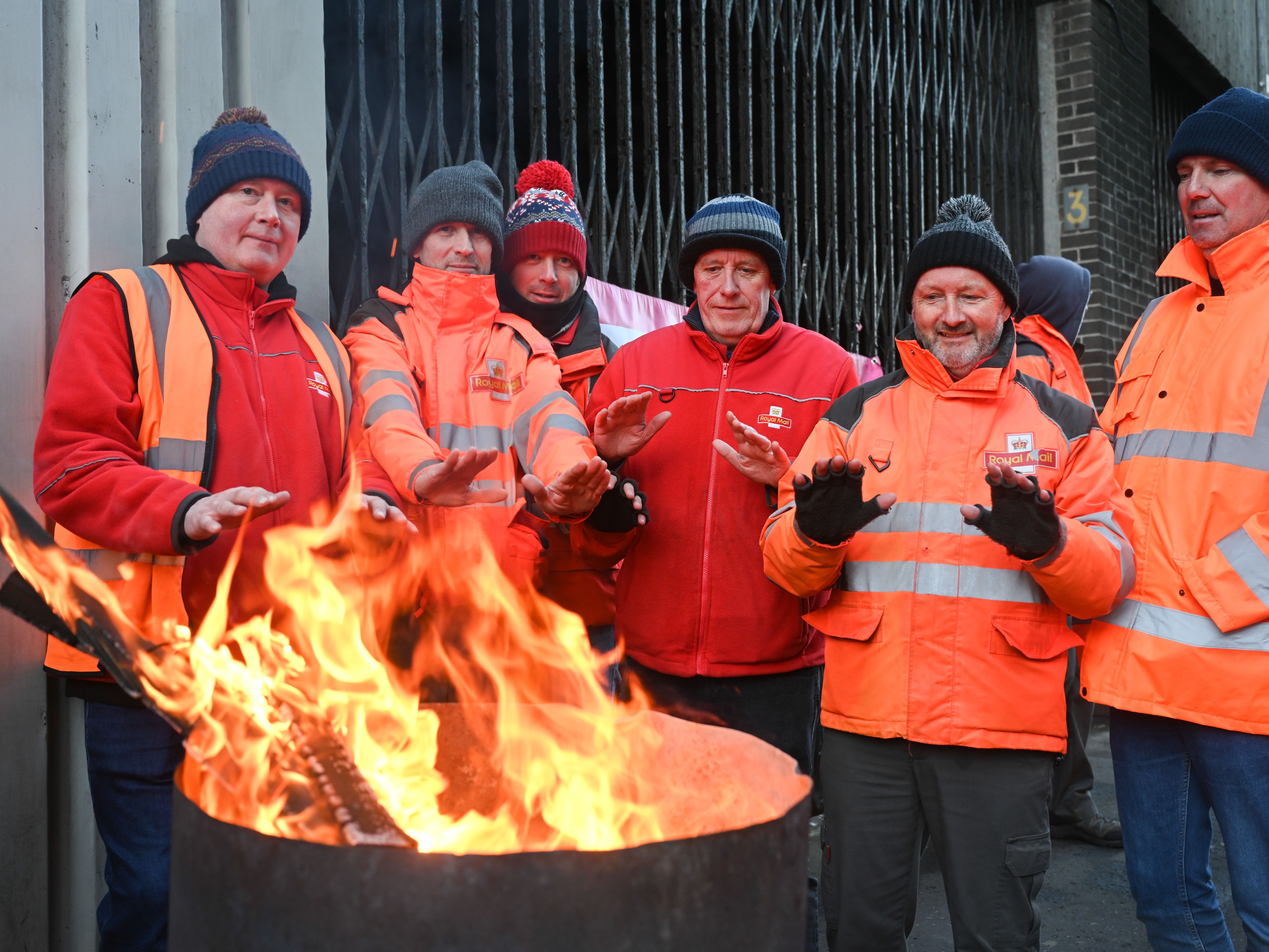 FURTHER STRIKE ACTION: Royal Mail employees outside the Tomb Street HQ in Belfast during strike action in December