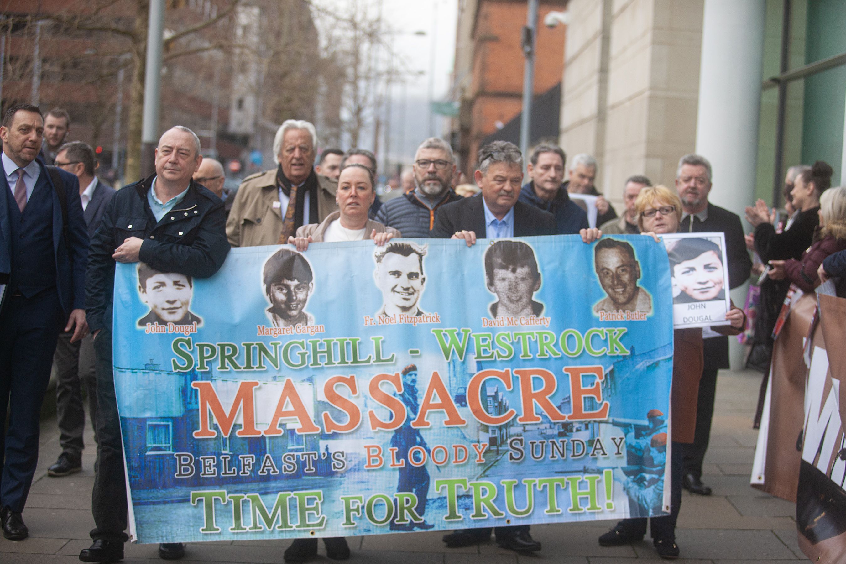 ARRIVAL: The families of the Springhill/Westrock Massacre stand shoulder to shoulder 