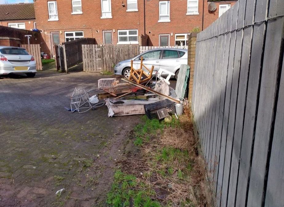 ENOUGH: Rubbish was dumped at the back of a residents house in Ardoyne