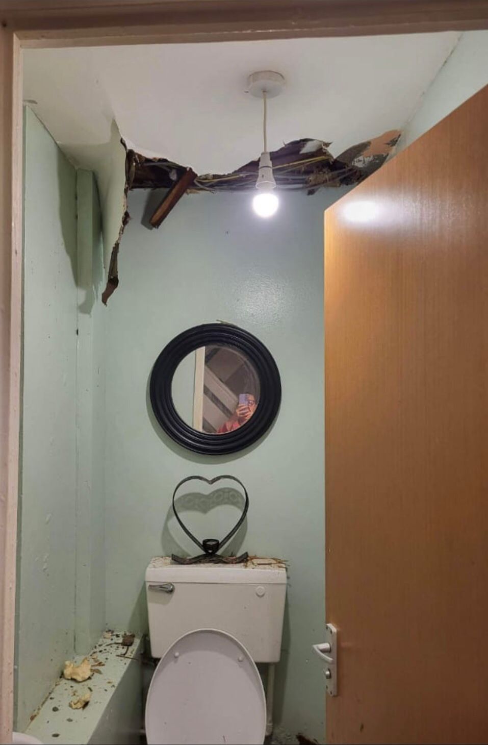 CRASH: A Poleglass mum has spoken out about the terrifying moment her bathroom ceiling collapsed