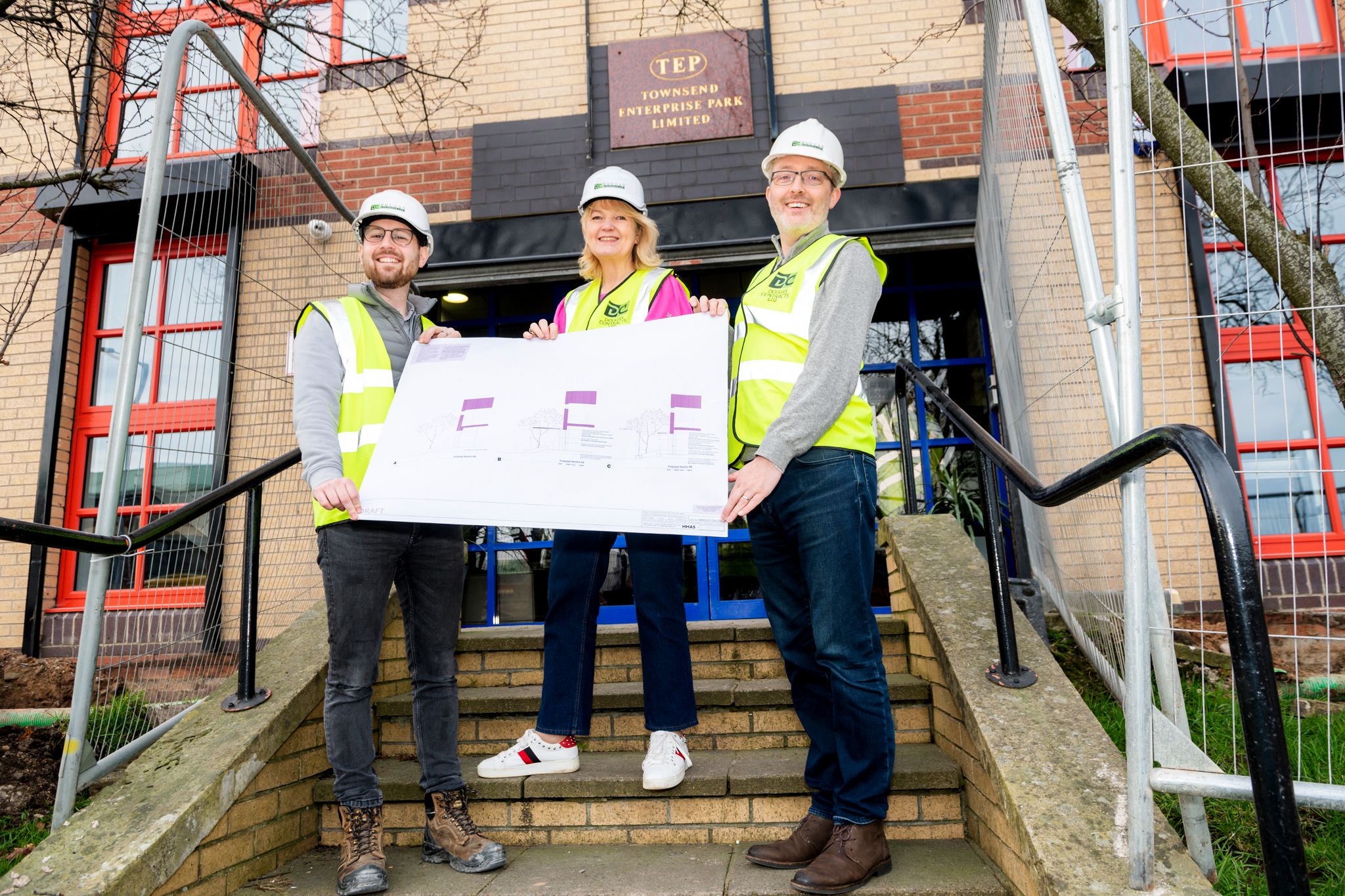 Ryan Dougan, Dougan Contracts is pictured with Margaret Patterson McMahon alongside Peter Darragh from Townsend Enterprise Park, Belfast