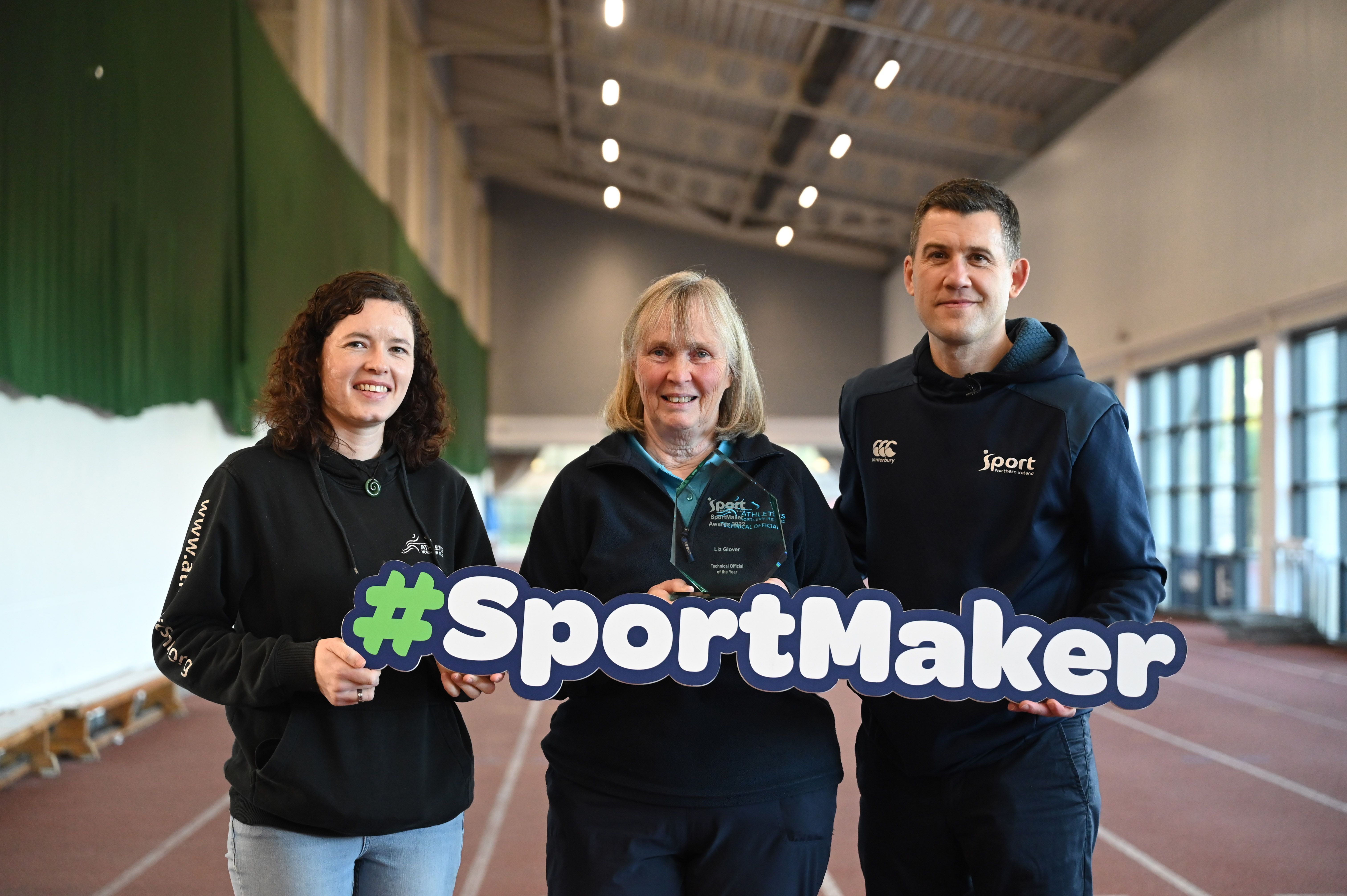 Shauna Bratten, Marketing and Communications and Events Manager at Athletics NI with Technical Official of the Year Liz Glover and Sport NI representative David Smyth