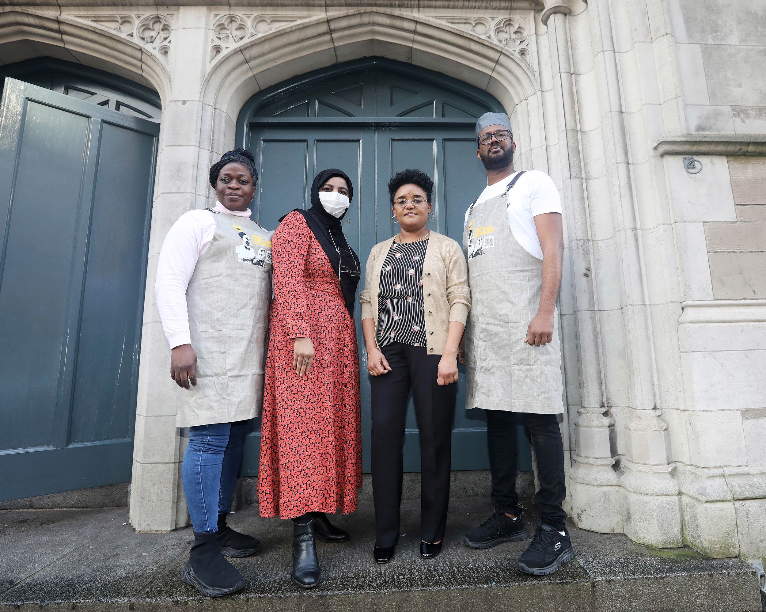 CONCERN: Twasul Mohammed from the Kind Economy campaign with Christiana, Afaq and Mohammed at a meeting in Belfast 