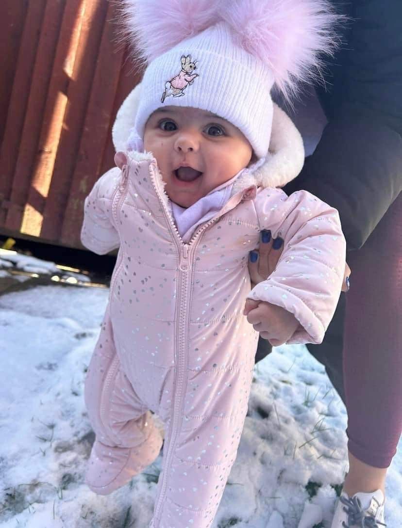 Amiyah-Grace looks delighted to see snowflakes