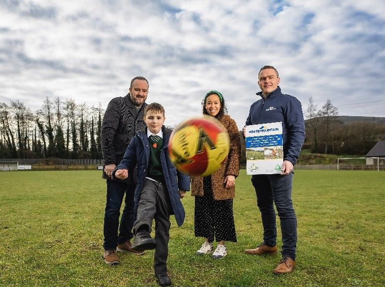 ON THE BALL: Kevin and Caoimhin Murphy (Colin Valley Football Club); Angelica Florez (Groundwork NI); Edward Kearney (Whitemountain Programme) 