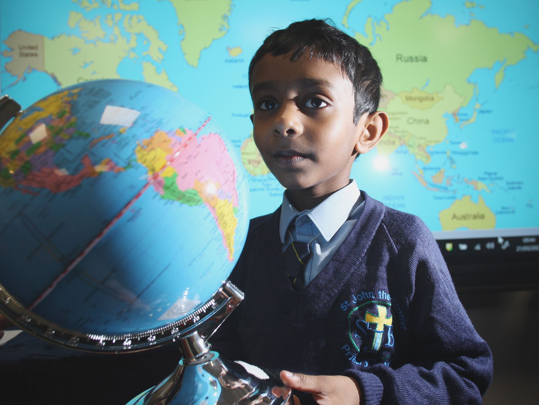NAME THAT COUNTRY: Five-year-old Sriyan is a pupil at St John the Baptist Primary School