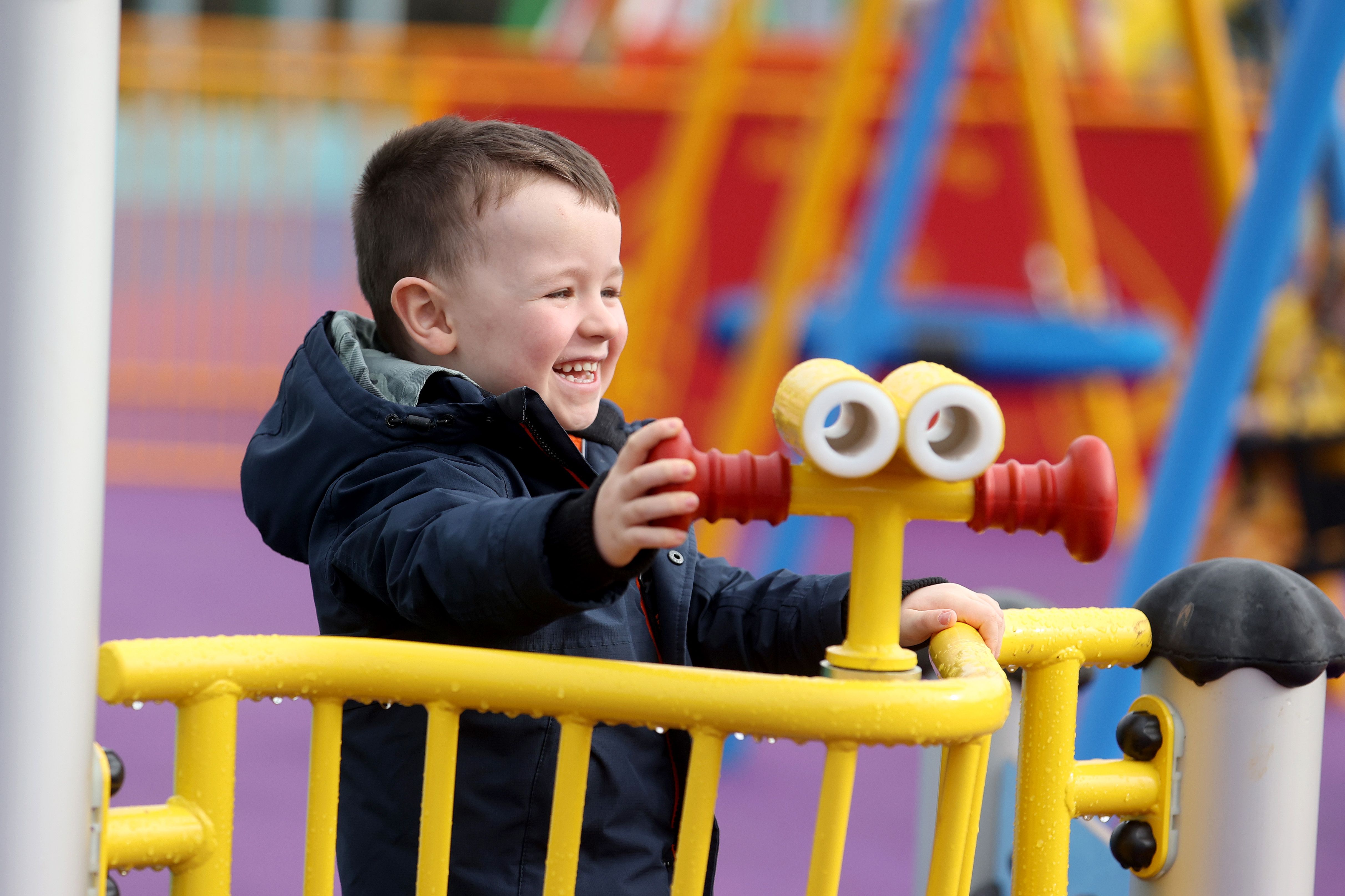 ALL SMILES: Tom McCullagh (4) enjoys some of the new play equipment in Westlands playground in the Waterworks Park 