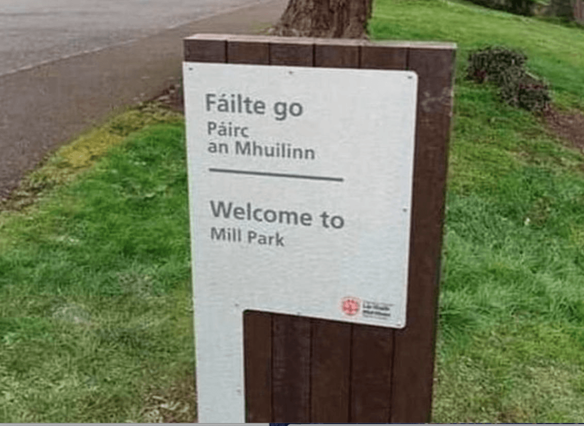 STOLEN: The bilingual sign at a Tobermore park was removed and replaced by plastic union jacks