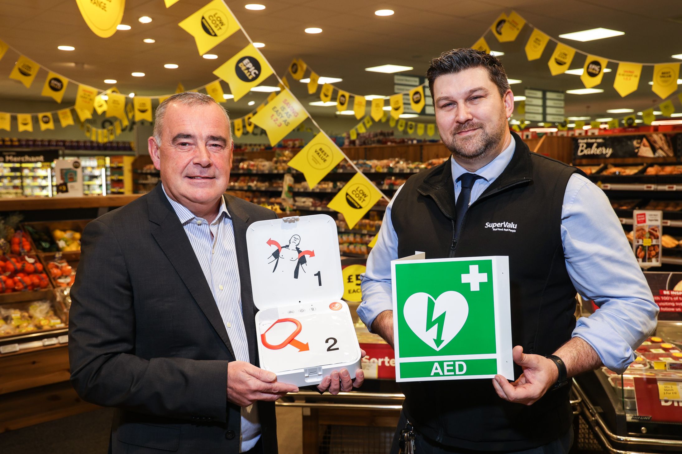 LIFE-SAVING: Trevor Magill, MD of Musgrave NI with Martin Reynolds, in SuperValu Dairy Farm