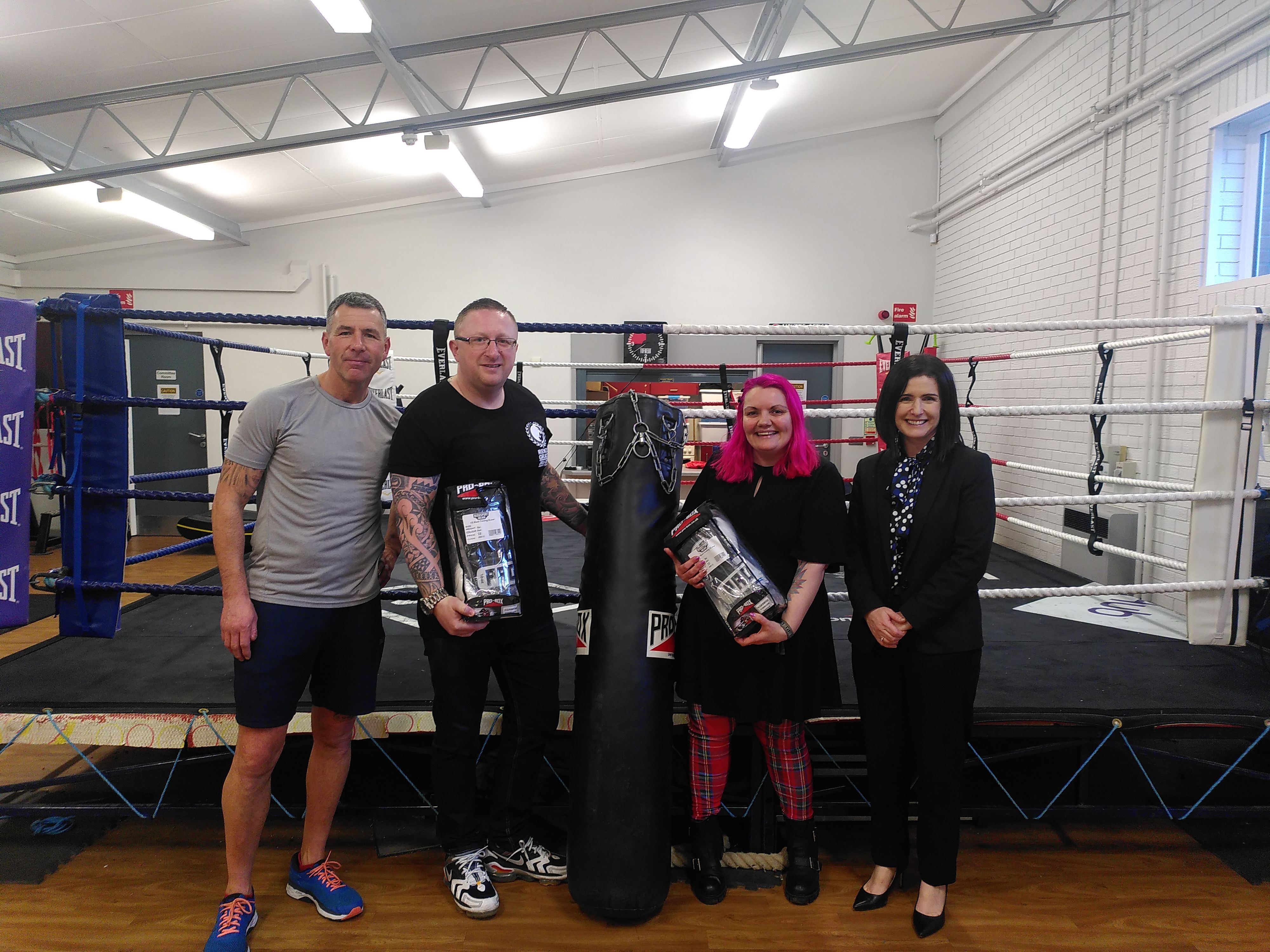 DONATION: Cooper McClure (Midland ABC), John and Celine (Inspire) with South Belfast Alliance MLA Paula Bradshaw 