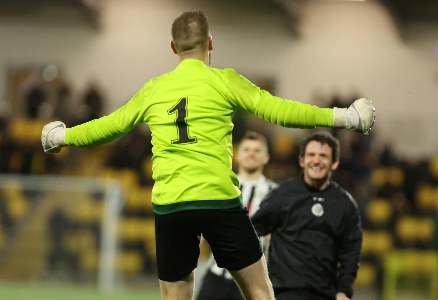 Deaglan McMahon slots home the winning penalty