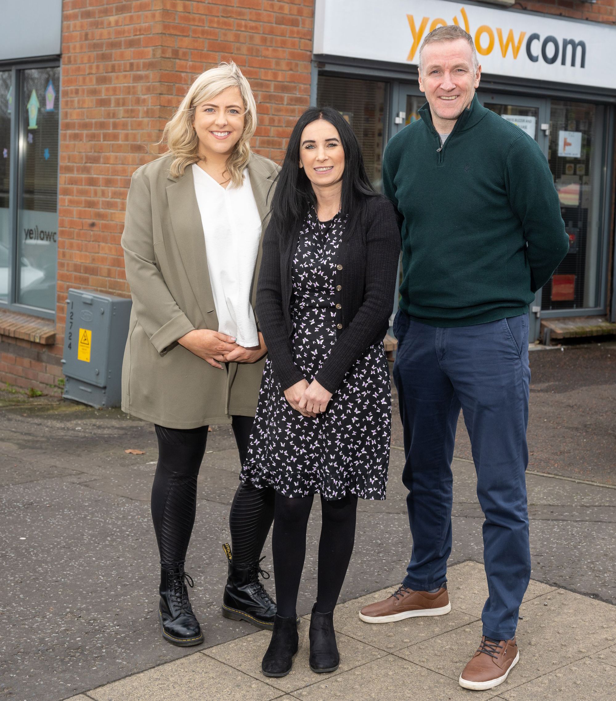 DELIGHT: Orlaith Bradley and Sharon McCloskey, both Kids Togethe,  with Phelim Sharvin, Head of Community Finance Ireland at the new Kids Together Springfield Road premises