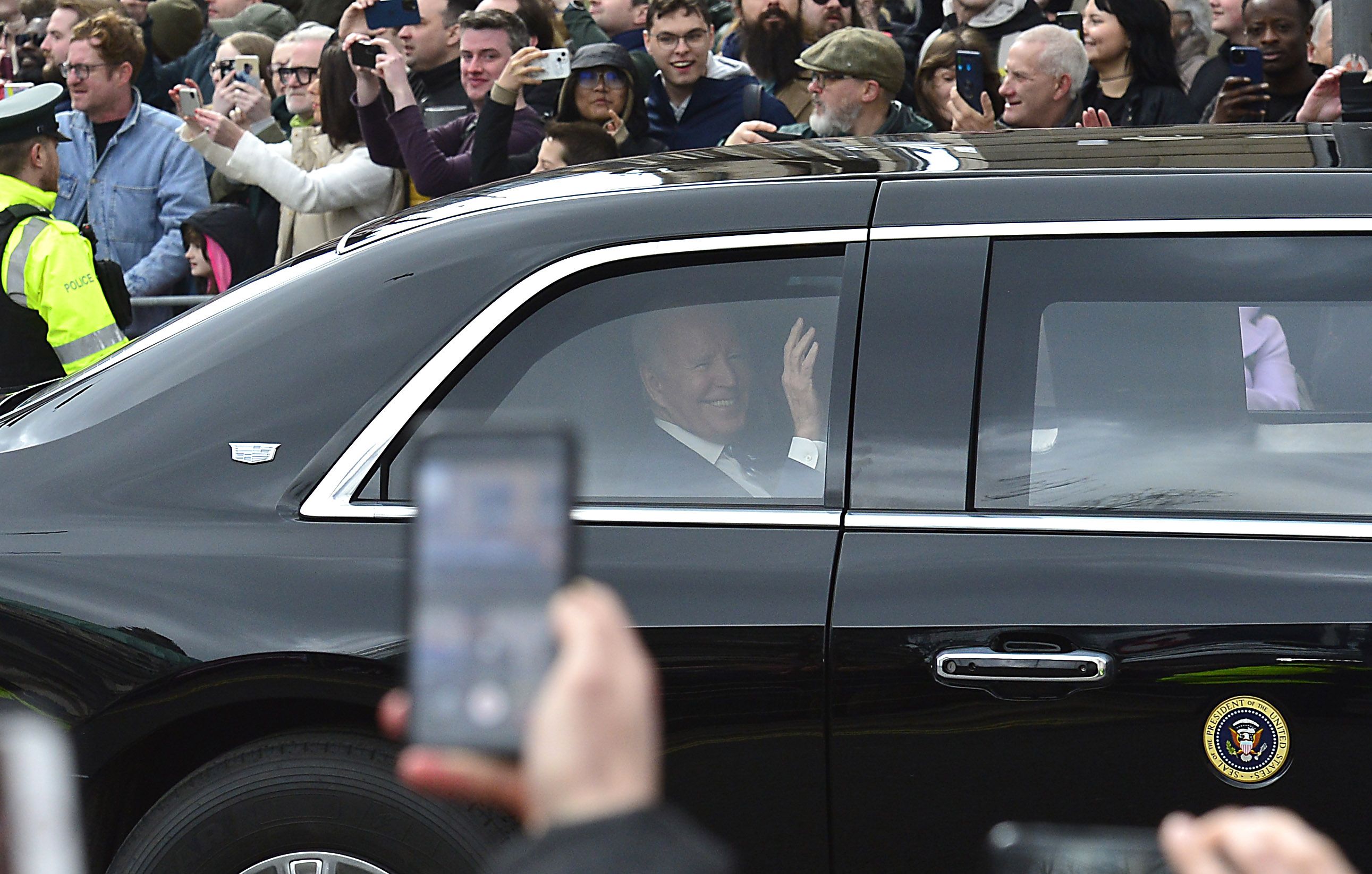 ARRIVAL: US President Joe Biden on his way to Ulster University in Belfast where he made his keynote speech, above