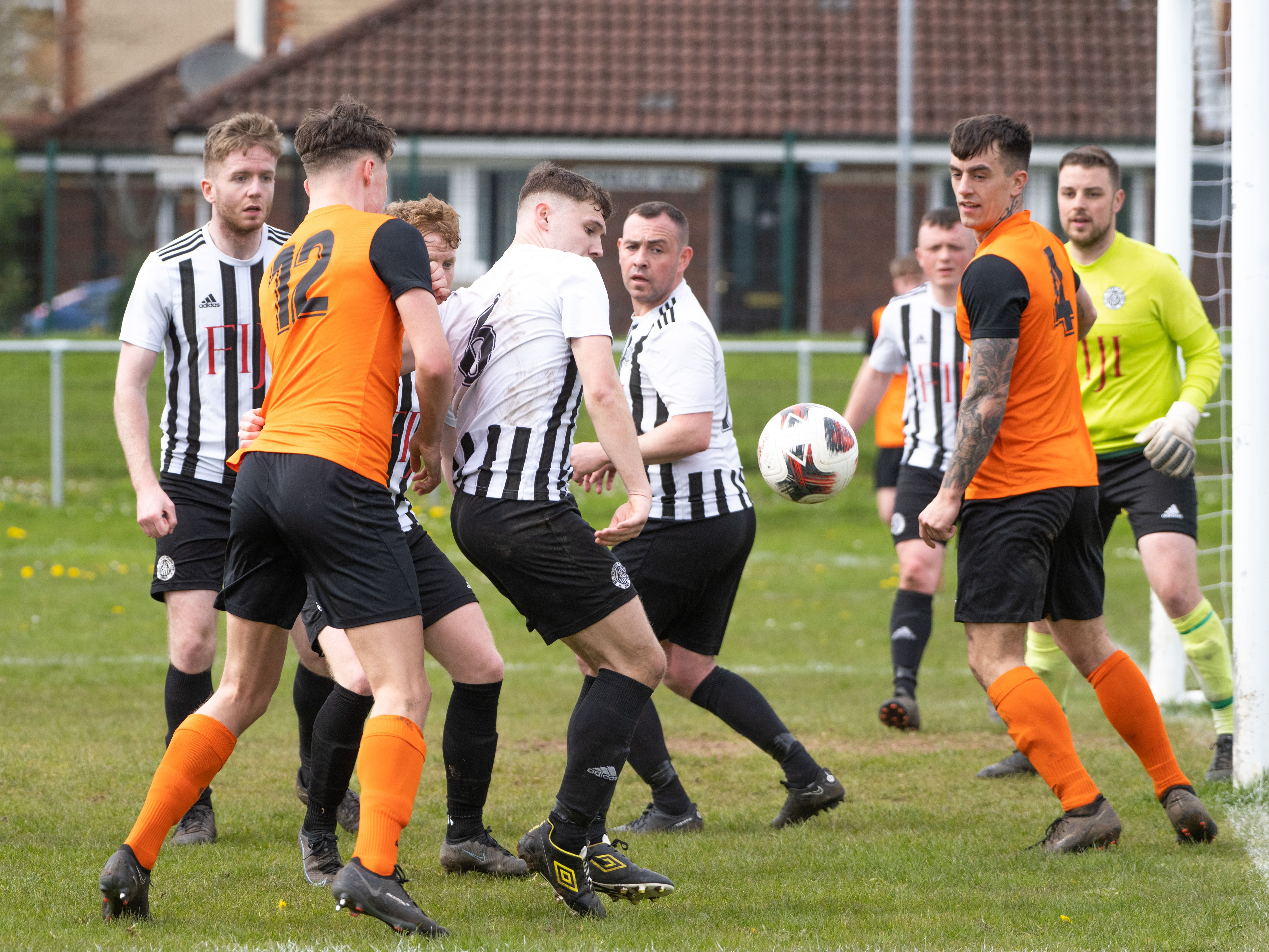 A scramble in the penalty area as Plunkett go on the attack on Saturday 