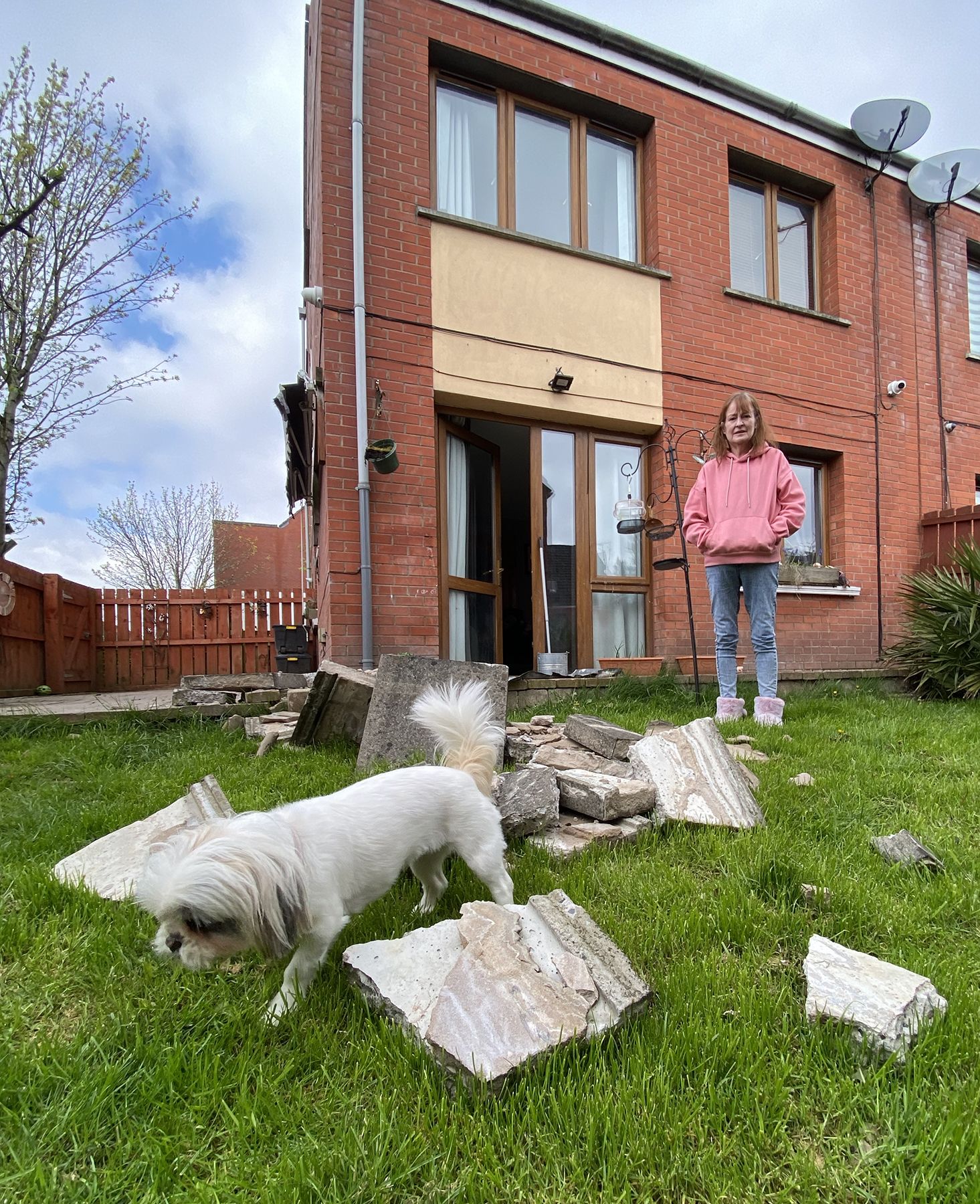 SCARED: Eithne Crowder surveys the damage of her collapsed roof at her Dunmore Avenue home