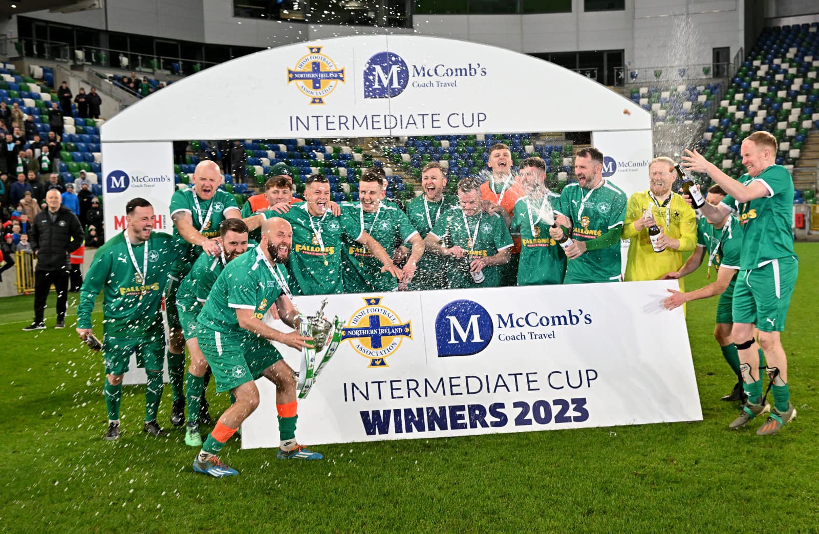 Crumlin Star celebrate as they lift the Intermediate Cup 