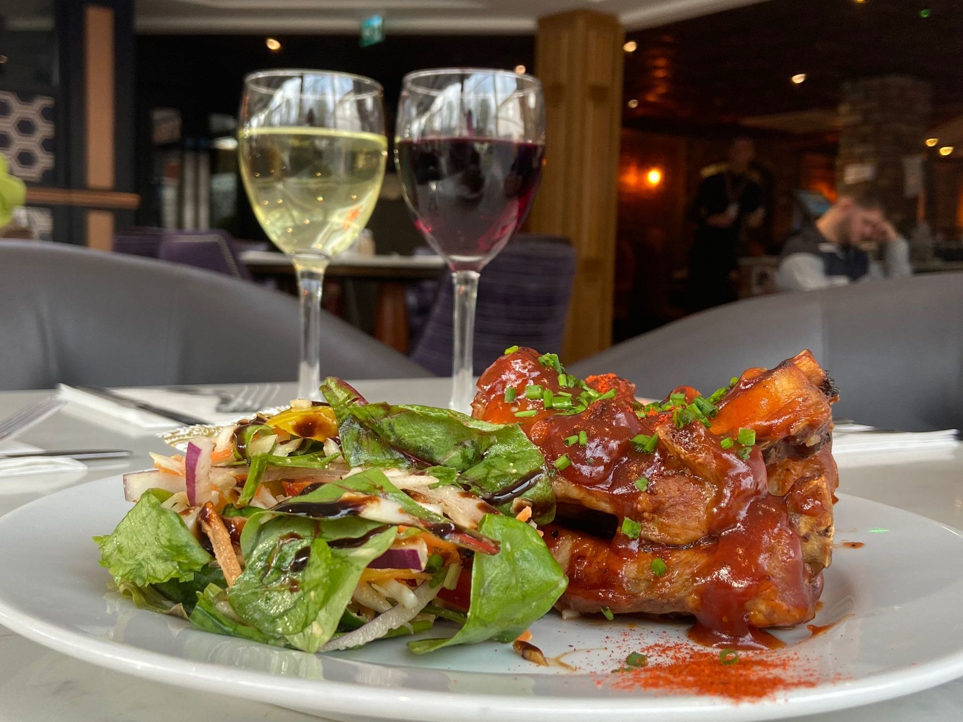 Baby Back Ribs, slow-cooked succulent pork ribs in a hickery BBQ sauce. 