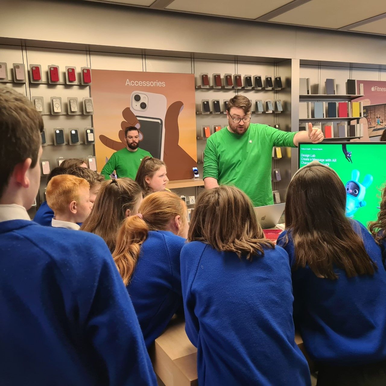 NEW IDEAS: Pupils from the school at the Apple store