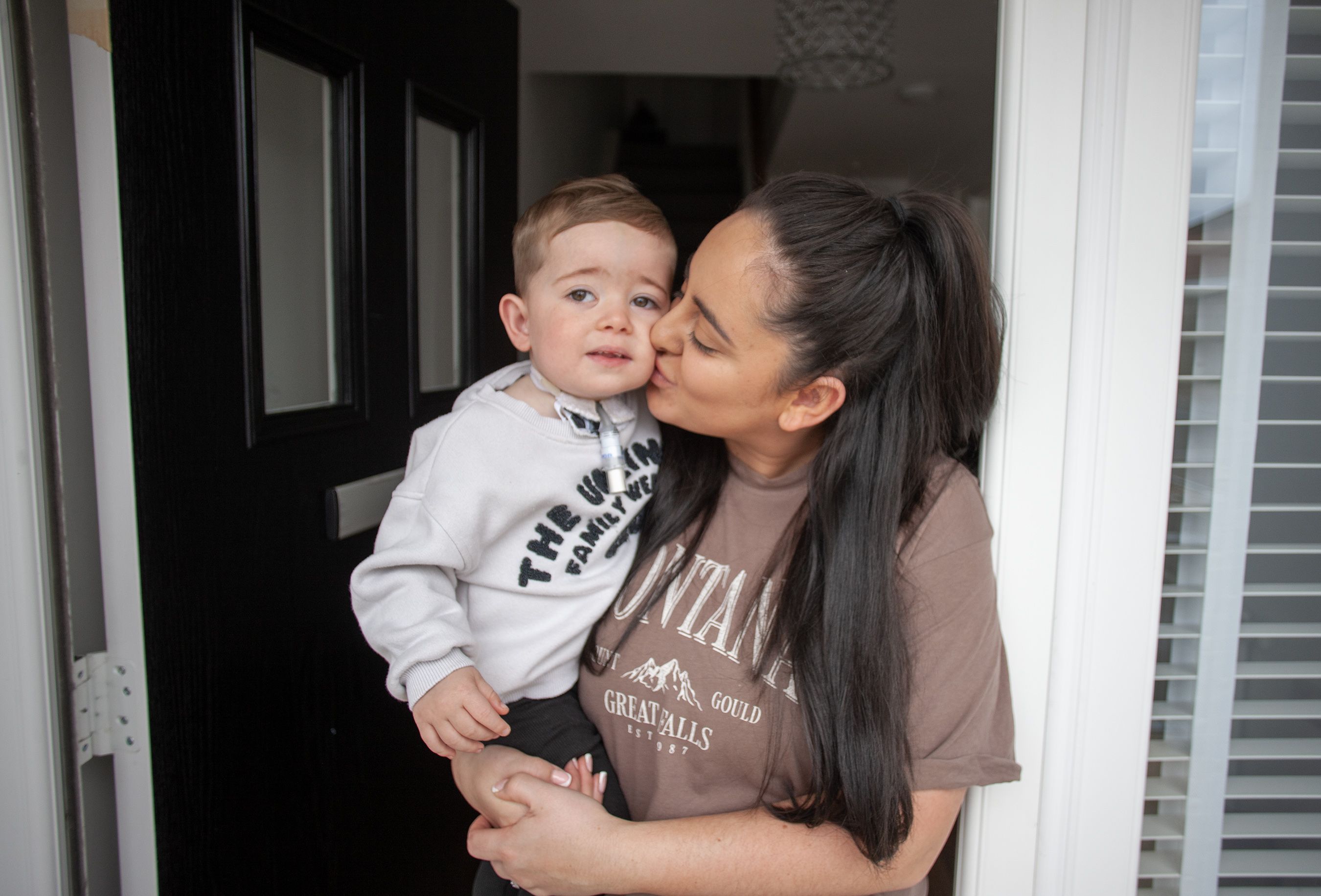 Baby Ríogán with his mum Niamh at their home in Dunmurry