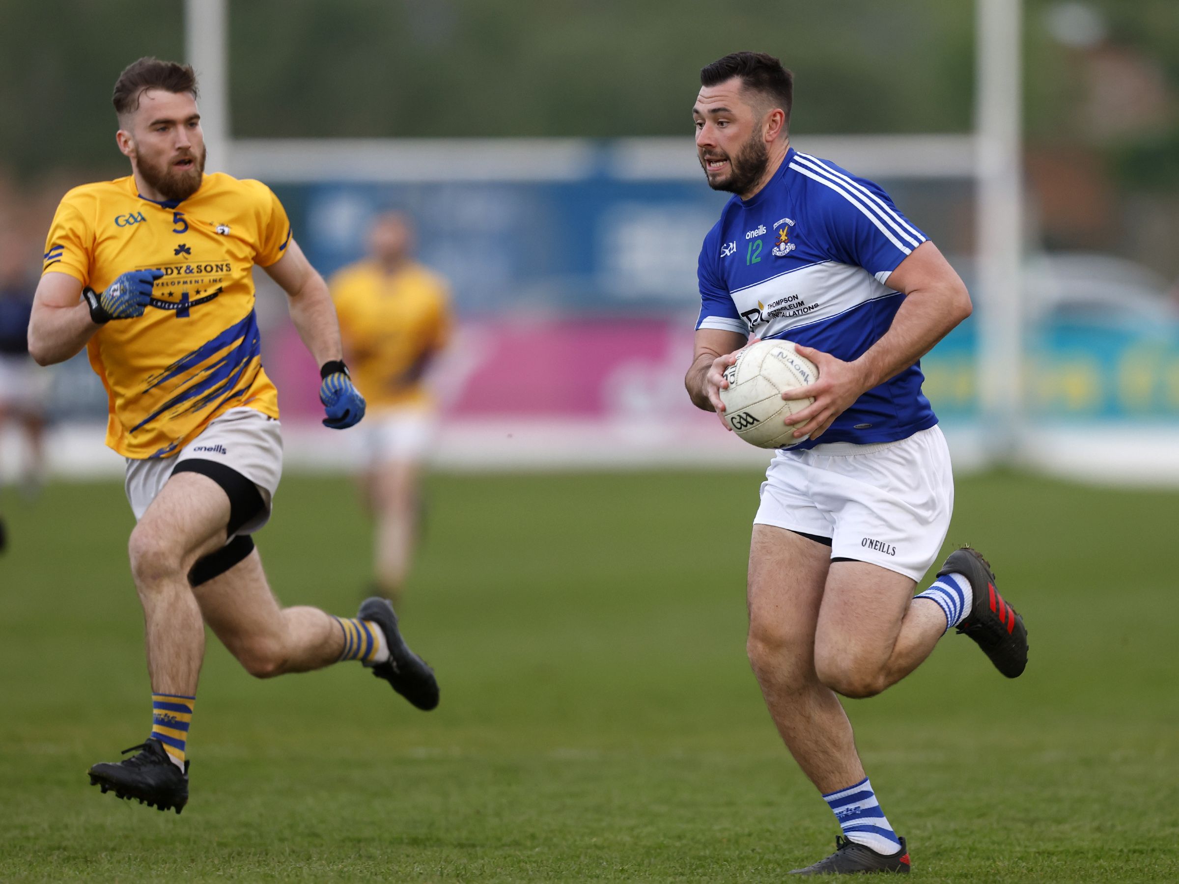 Richard Gowdy tracks Padraig Nugent at Corrigan Park on Wednesday 