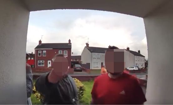 THREATS: Two thugs at the door of a young mum in Lurgan this week