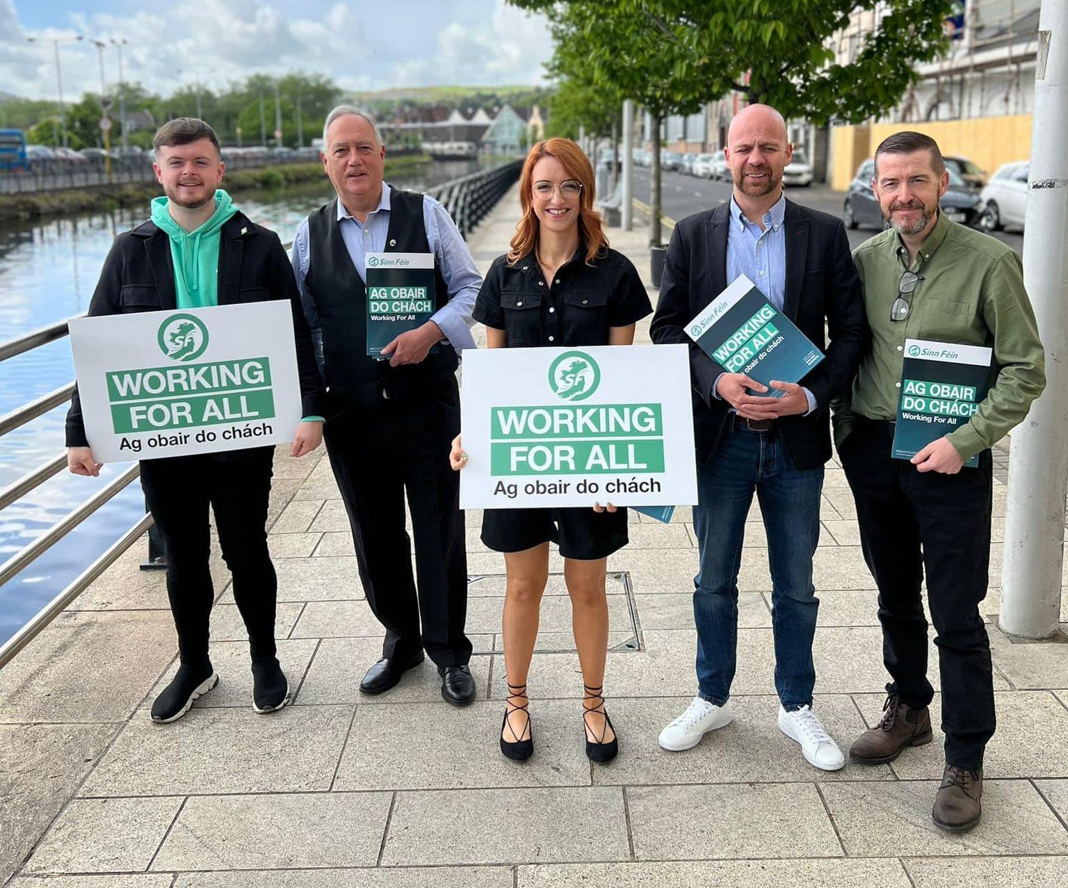 TEAM: Sinn Féin Colin DEA candidates Caoimhín McCann, Séanna Walsh, Clíodhna Nic Bhranair, Joe Duffy and Matt Garrett 