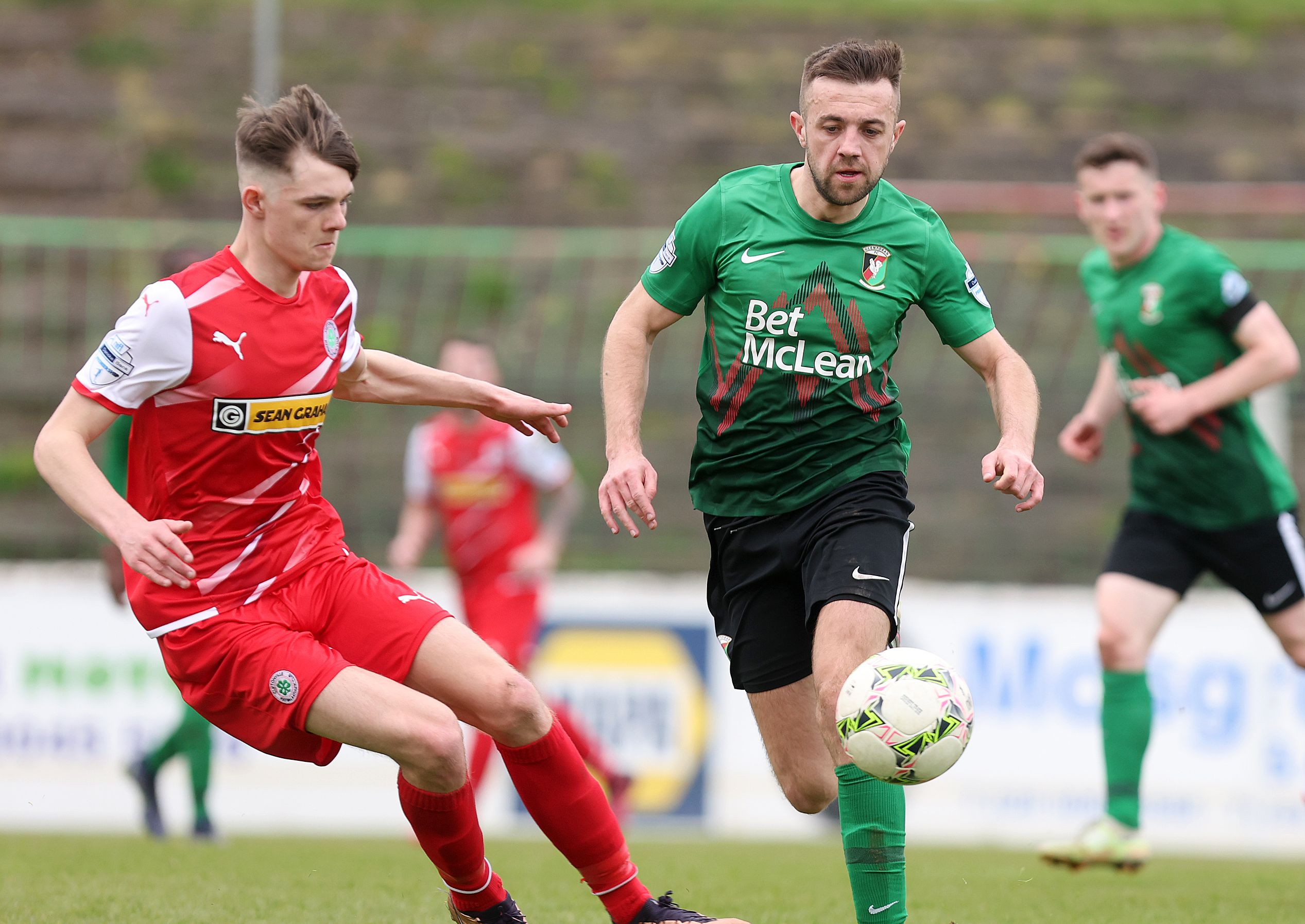 Conor McMenamin and Sean Moore in action during Glentoran\'s win over Cliftonville last month 