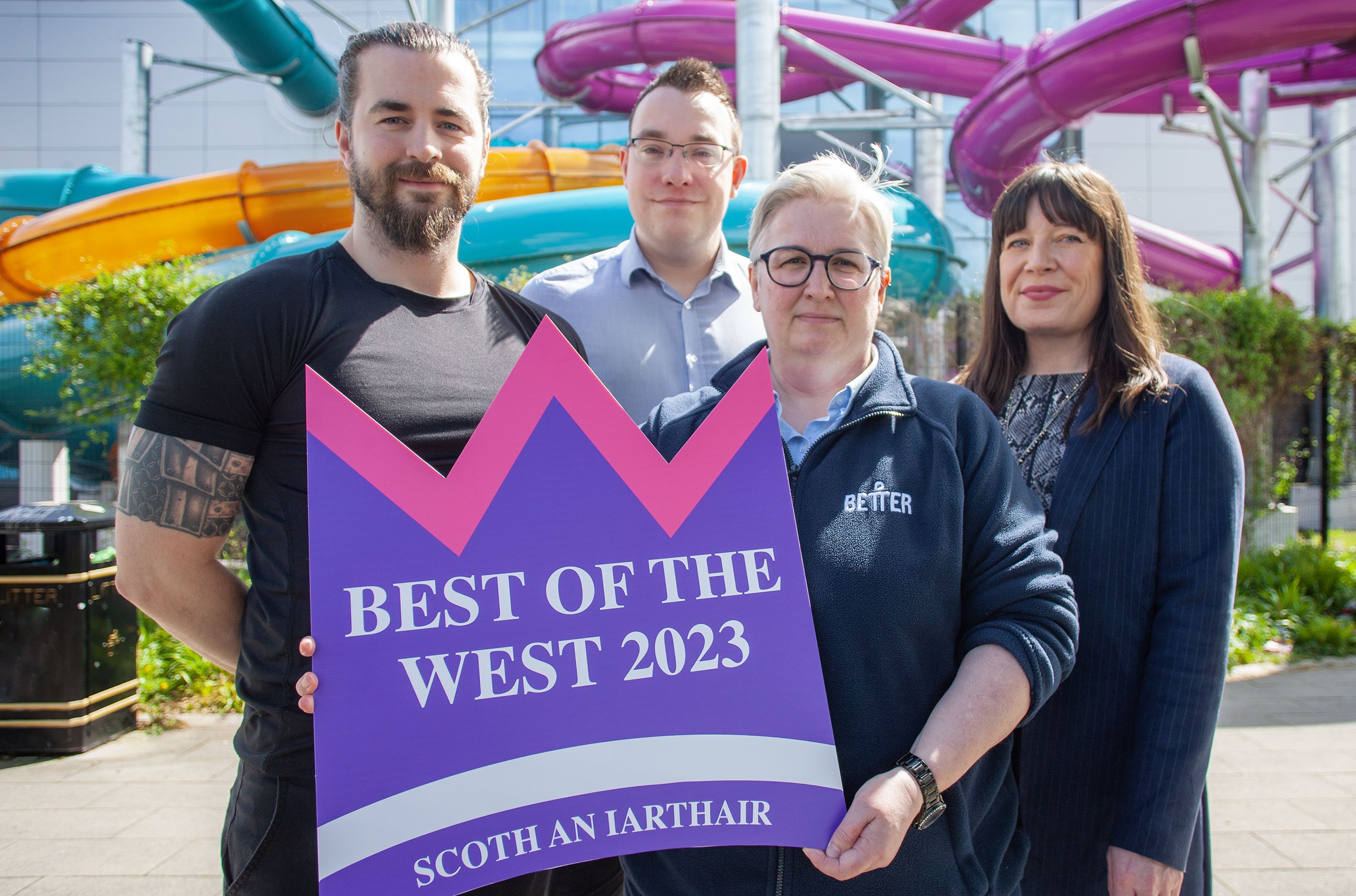 GLL MAKES IT BETTER: Better staff member James Fryers, Conor McParland, Andersonstown News, with Julie Bolton, General Manager Andersonstown Leisure Centre, and Sarah Owens, Better Regional Marketing Manager
