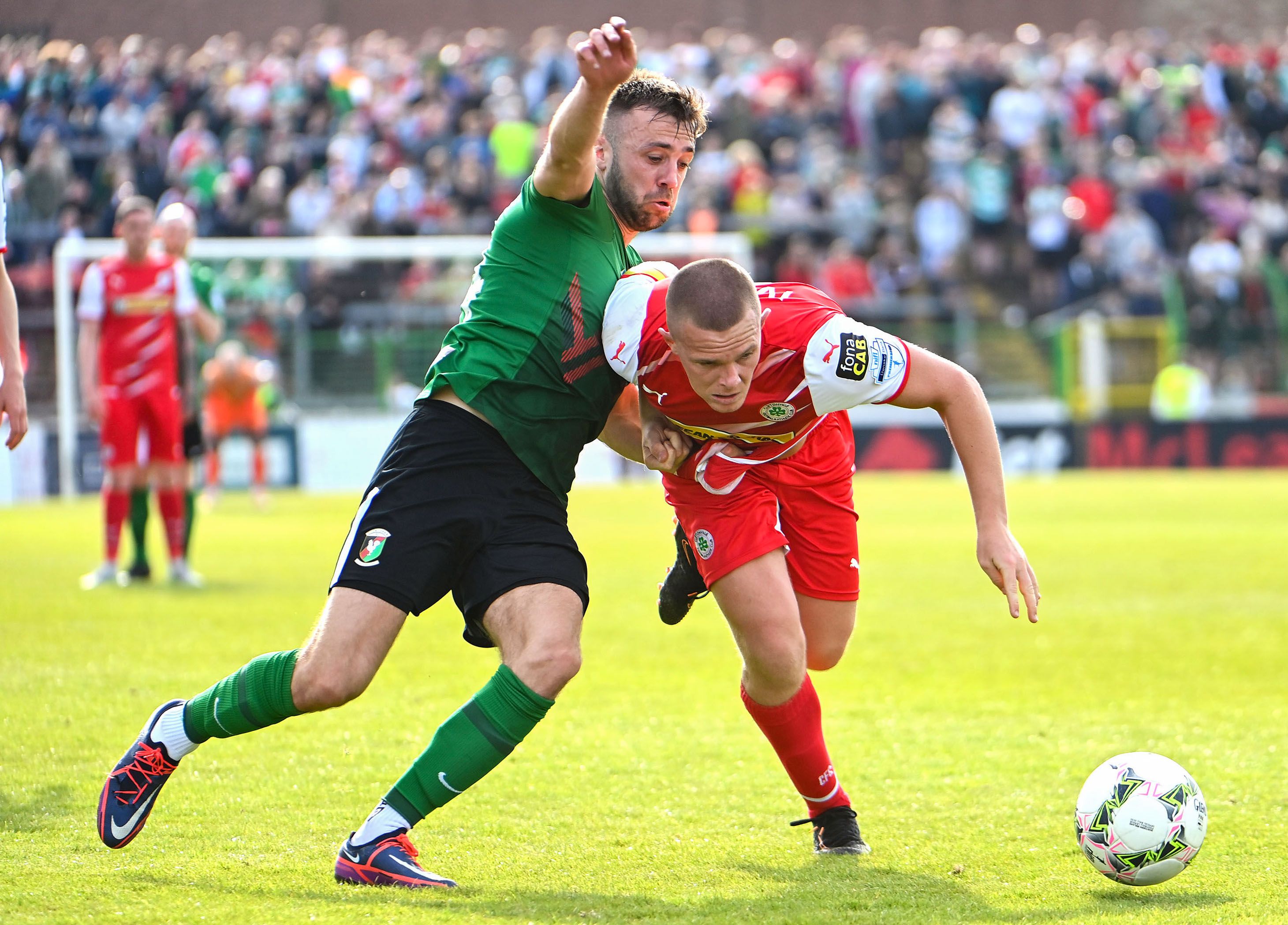 Conor McMenamin and Levi Ives in action during Glentoran\'s win over Cliftonville on Saturday 