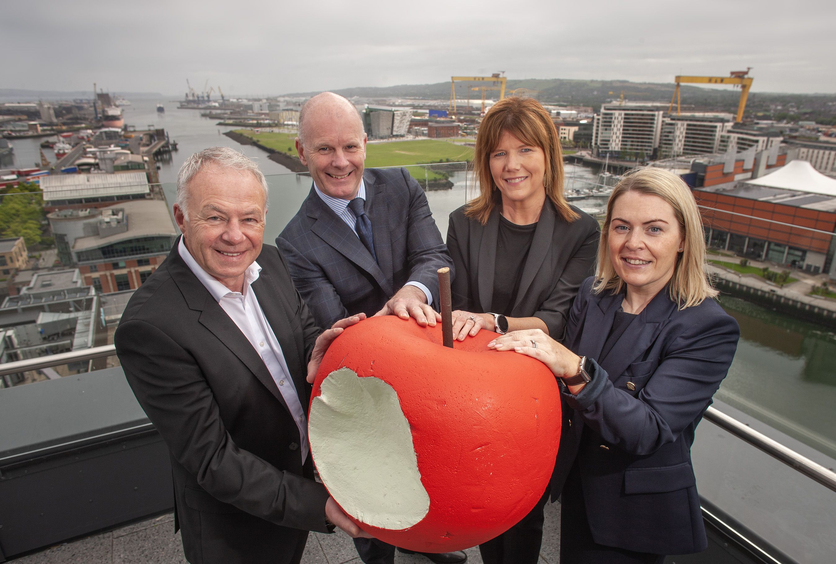 TAKING A BITE: John Walsh, Chief Executive of Belfast City Council; Joe O’Neill, CEO of Belfast Harbour; Clare Guinness, Innovation District Director at Belfast City Council and Ashleen Feeney, Markets Partner at KPMG 