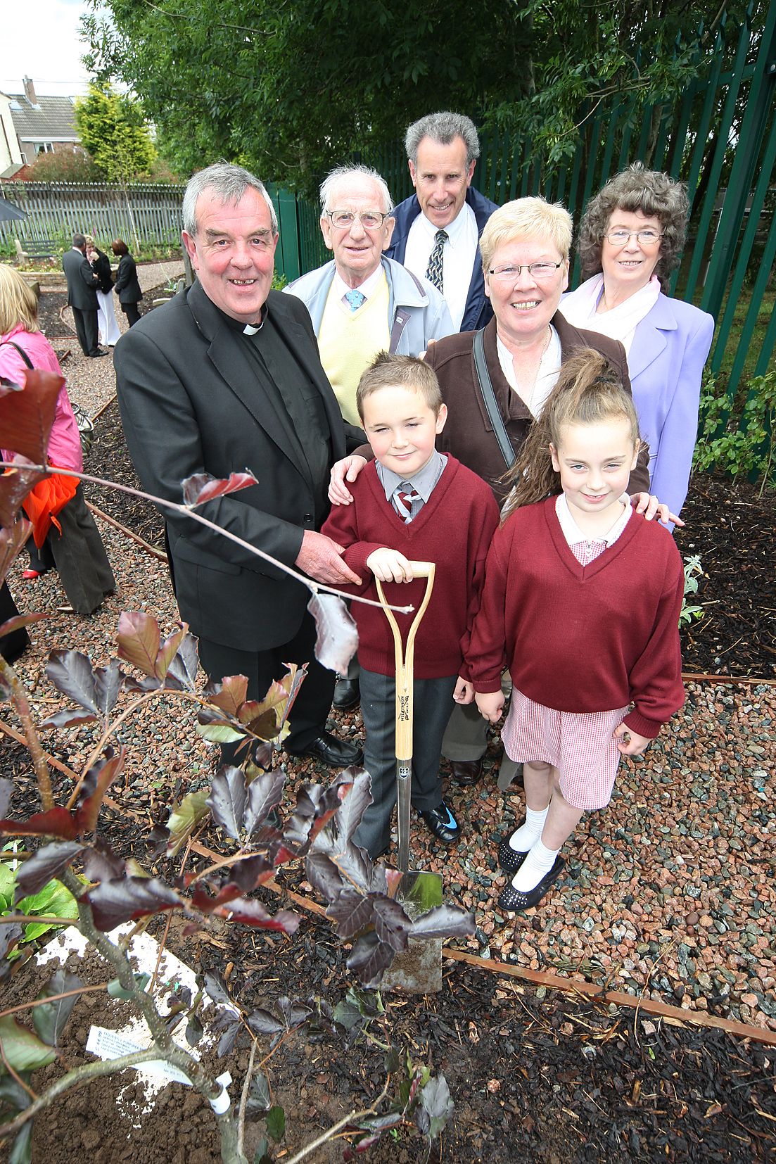 PEOPLE\'S PRIEST: Official opening of the Holy Trinity Sensory garden by Father Matt Wallace in 2008, with Cllr Marie Cush, pupils Sean Og Lee and Lauryn Rooney, John De Ornellas, Holy Trinity PS and Noel and Kathleen Devine