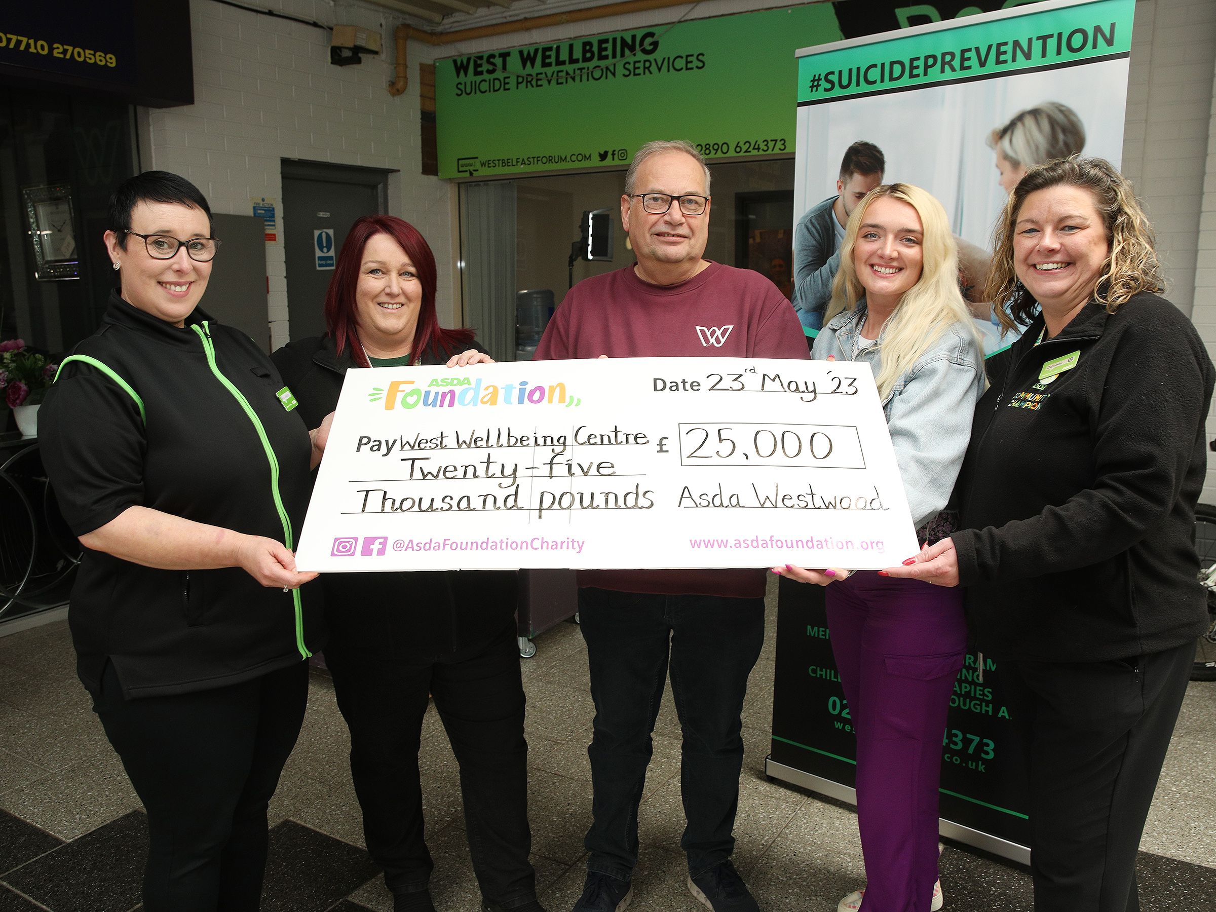 FUNDING: Ann-Marie McCallion, Asda Westwood, Sharon McBratney, Asda Dundonald, Desi Jones, West Welbeing, Emma Byrne, Art Psychotherapist and Catherine McCallion, Asda Larne receive the £25,000 for West Wellbeing