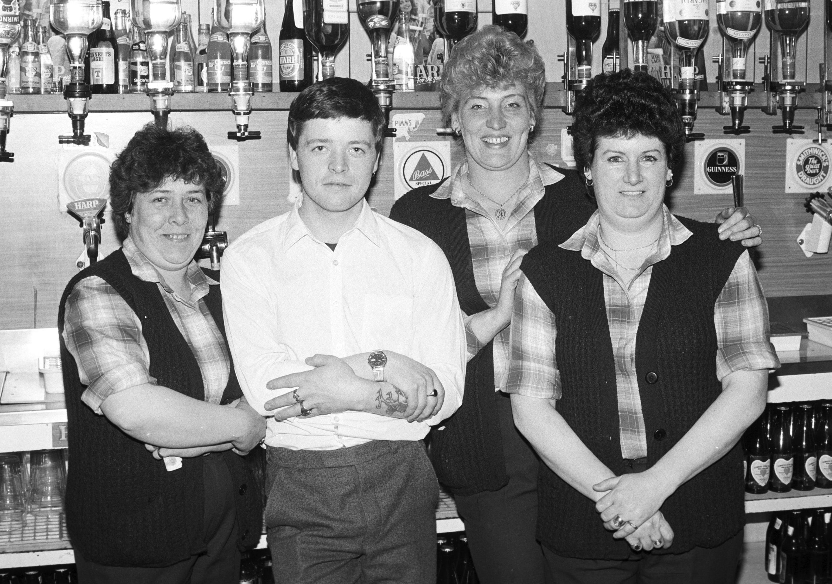TOP TEAM: Volunteer bar staff at New Lodge Celtic Minibus Supporters Club Fundraising Appeal for St Patrick\'s School in June 1982