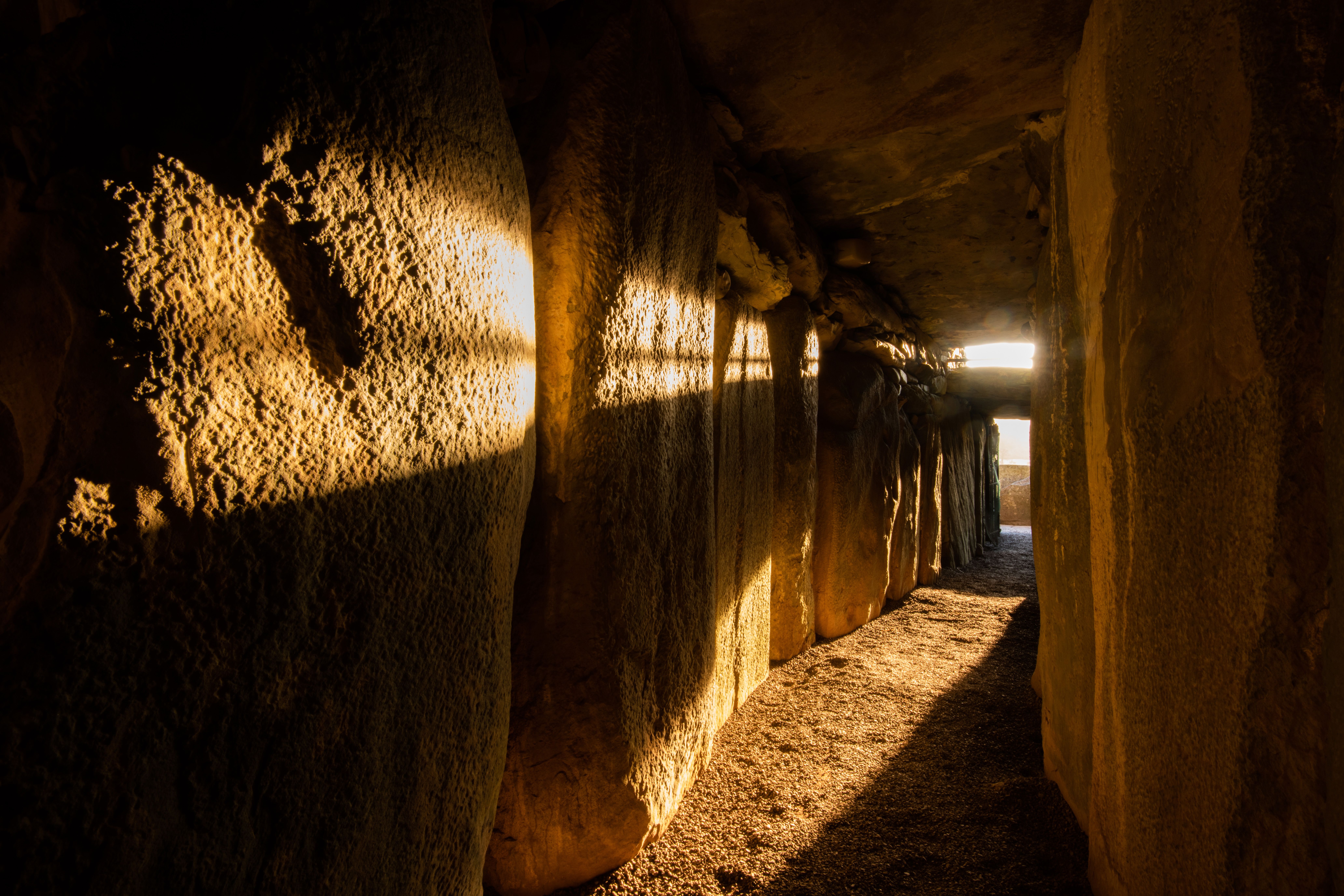 INTO THE MYSTIC: The rising sun creeps into the ancient interior of Newgrange