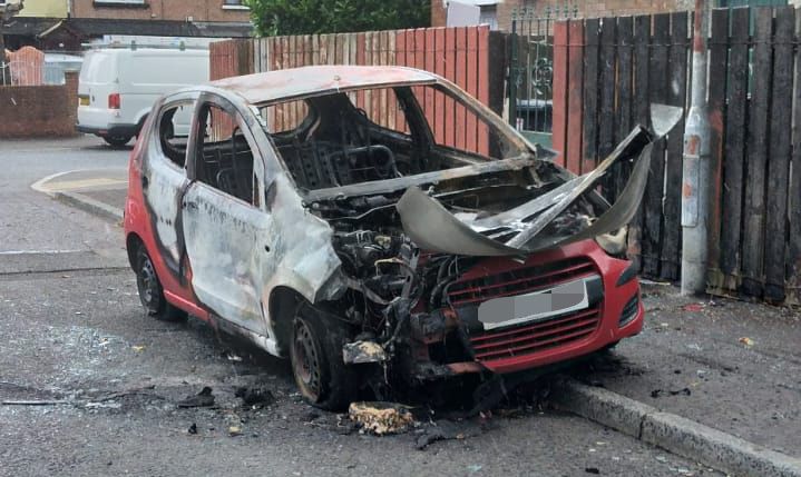 STOLEN: The burnt out car was discovered in the Etna Drive area of Ardoyne