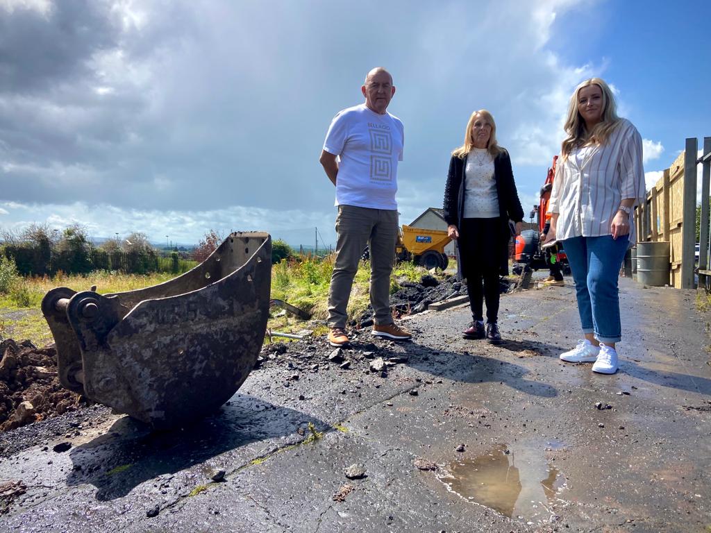 WORK STARTS: Sinn Féin Councillor Arder Carson, Chair of the Upper Lenadoon Residents\' Annmarie Weir, and SINN Féin MLA Órlathí Flynn