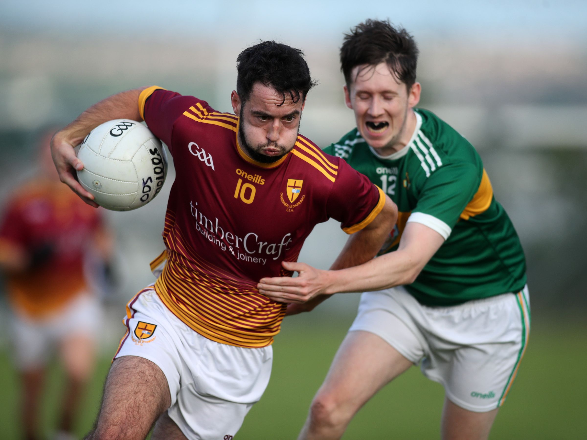Patrick Meenan bursts past the challenge of Philip Murray 