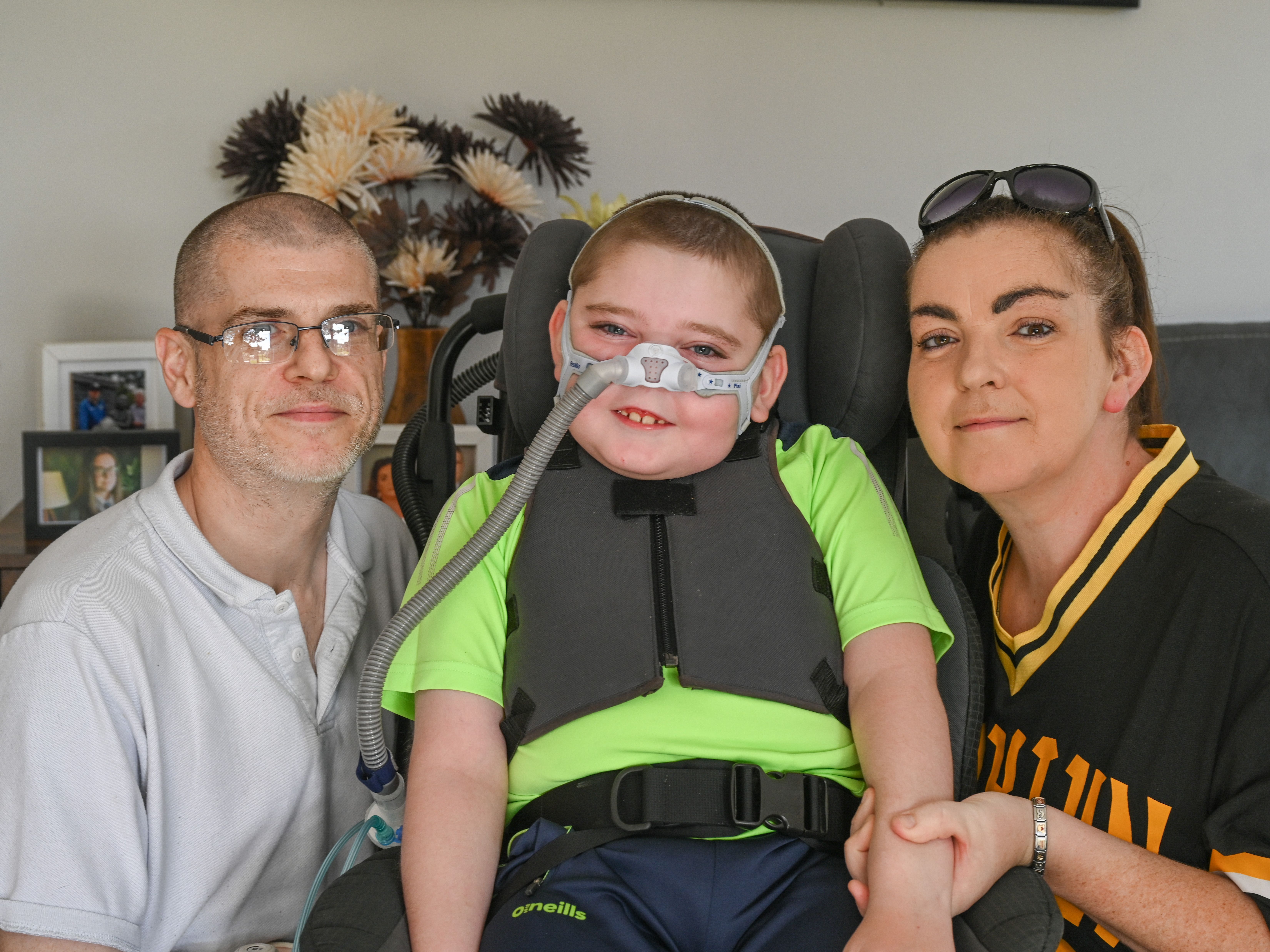 TOGETHER: Caoimhín (8) with mum Caitriona and dad Kieran last year