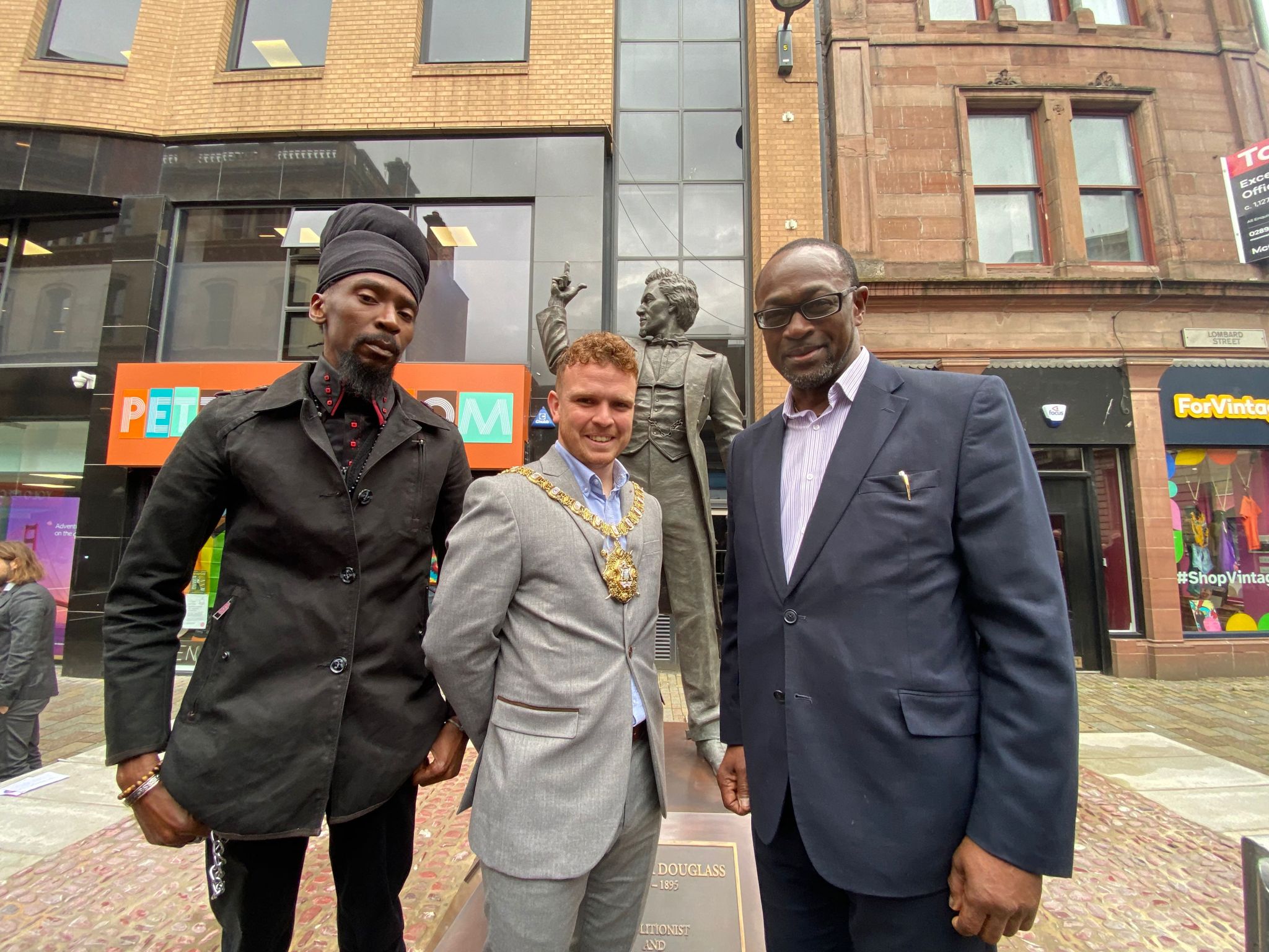 \'CAUSE OF HUMANITY ONE THE WORLD OVER\': Lord Mayor Ryan Murphy with Takura Donald Magoni and Rev Livingstone Thompson of the African Caribbean Association of NI at the unveiling of the Frederick Douglass statue
