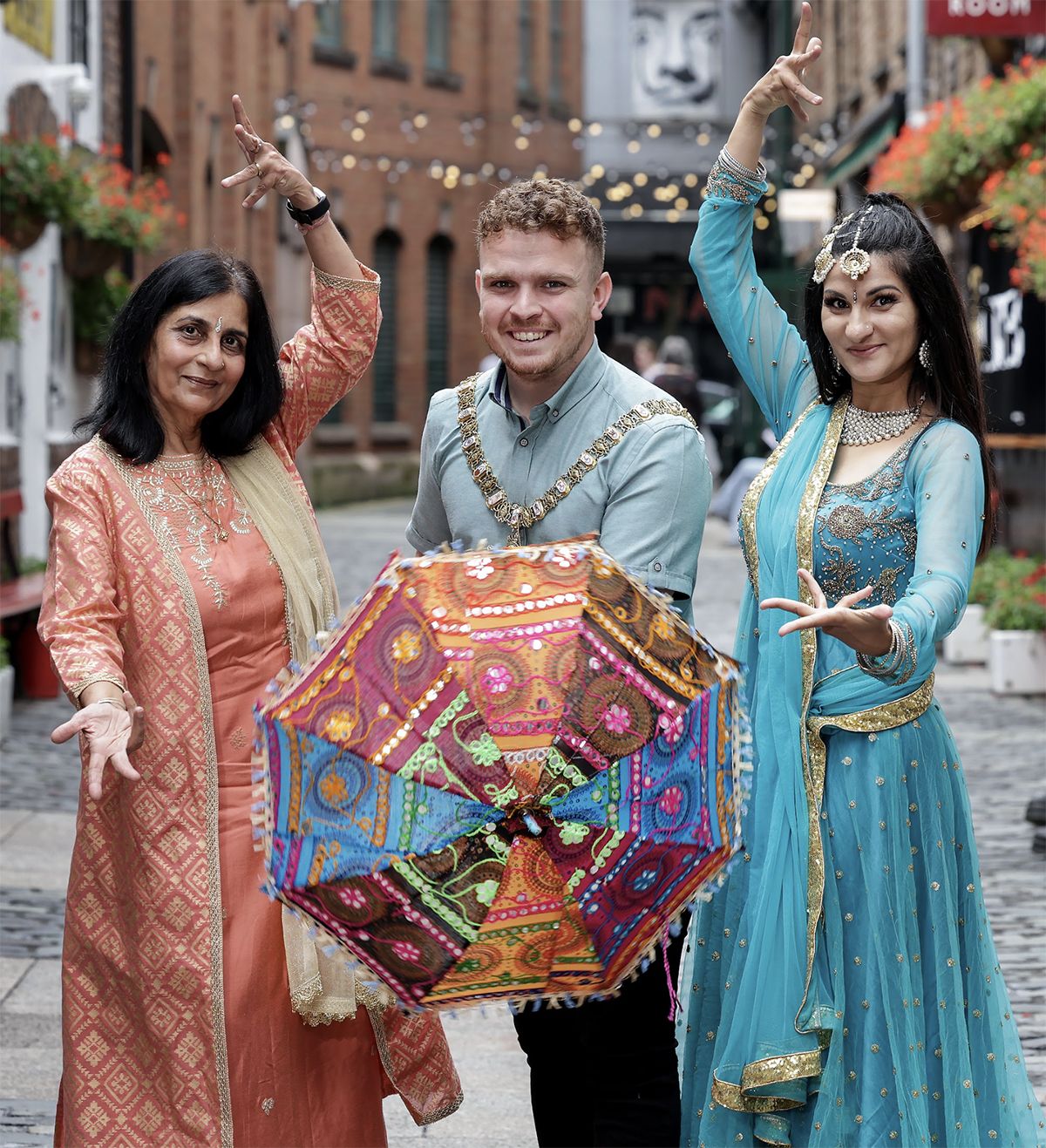 COLOURFUL: Nisha Tandon, CEO ArtsEkta, Lord Major of Belfast Councillor Ryan Murphy and South Asian Dance Academy dancer Leyla Gailius at the launch