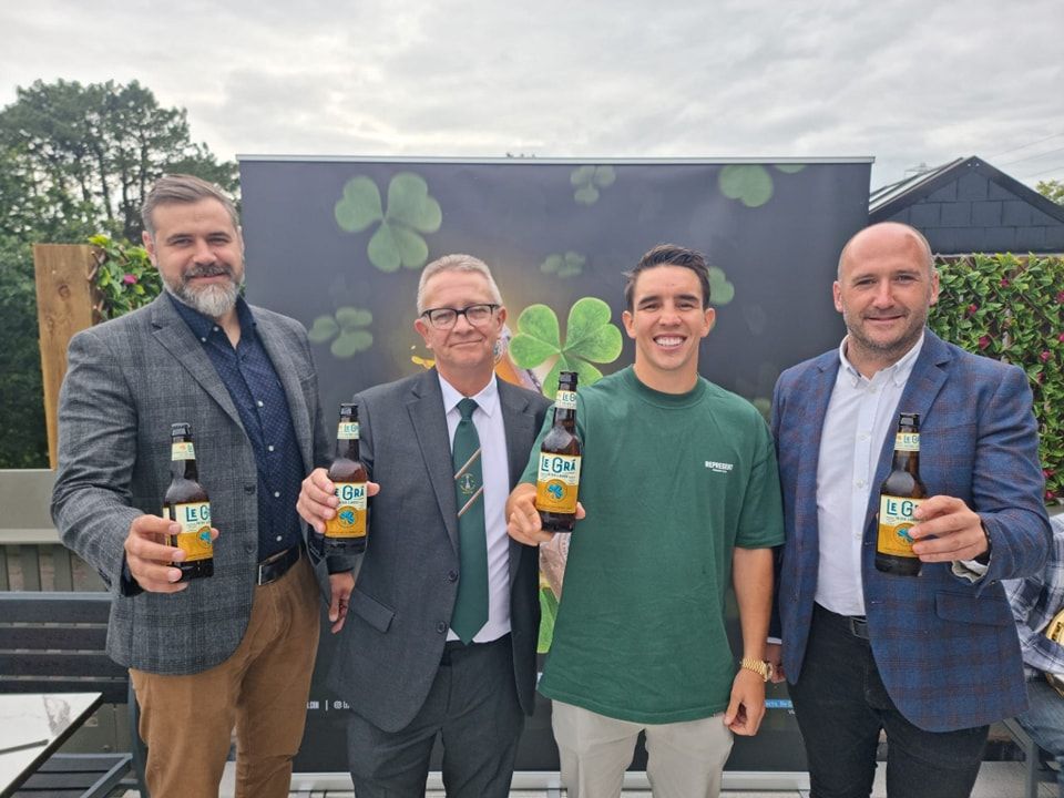 SLÁINTE: Harry Connolly of Fáilte Feirste Thiar, Roddy\'s Director Davy McGivern, Michael Conlan and Kevin Gamble, Director Féile an Phobail