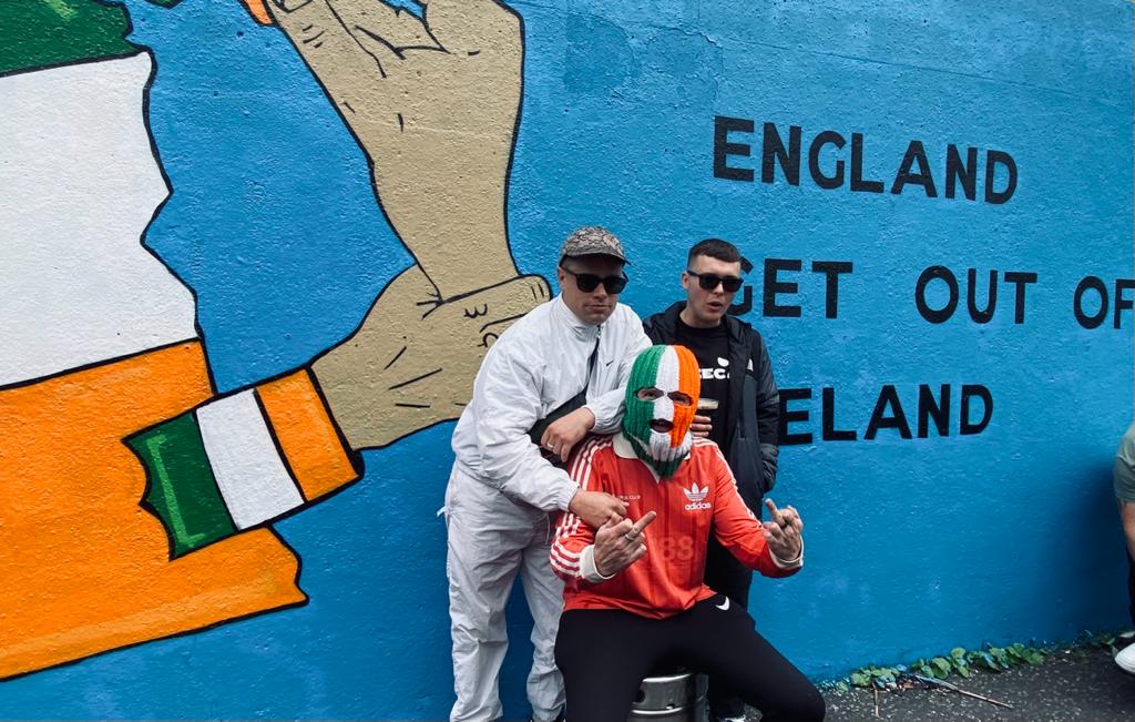 WATCH: Kneecap tell loyalist youth 'we are all one' at mural unveiling - Vimarsana News