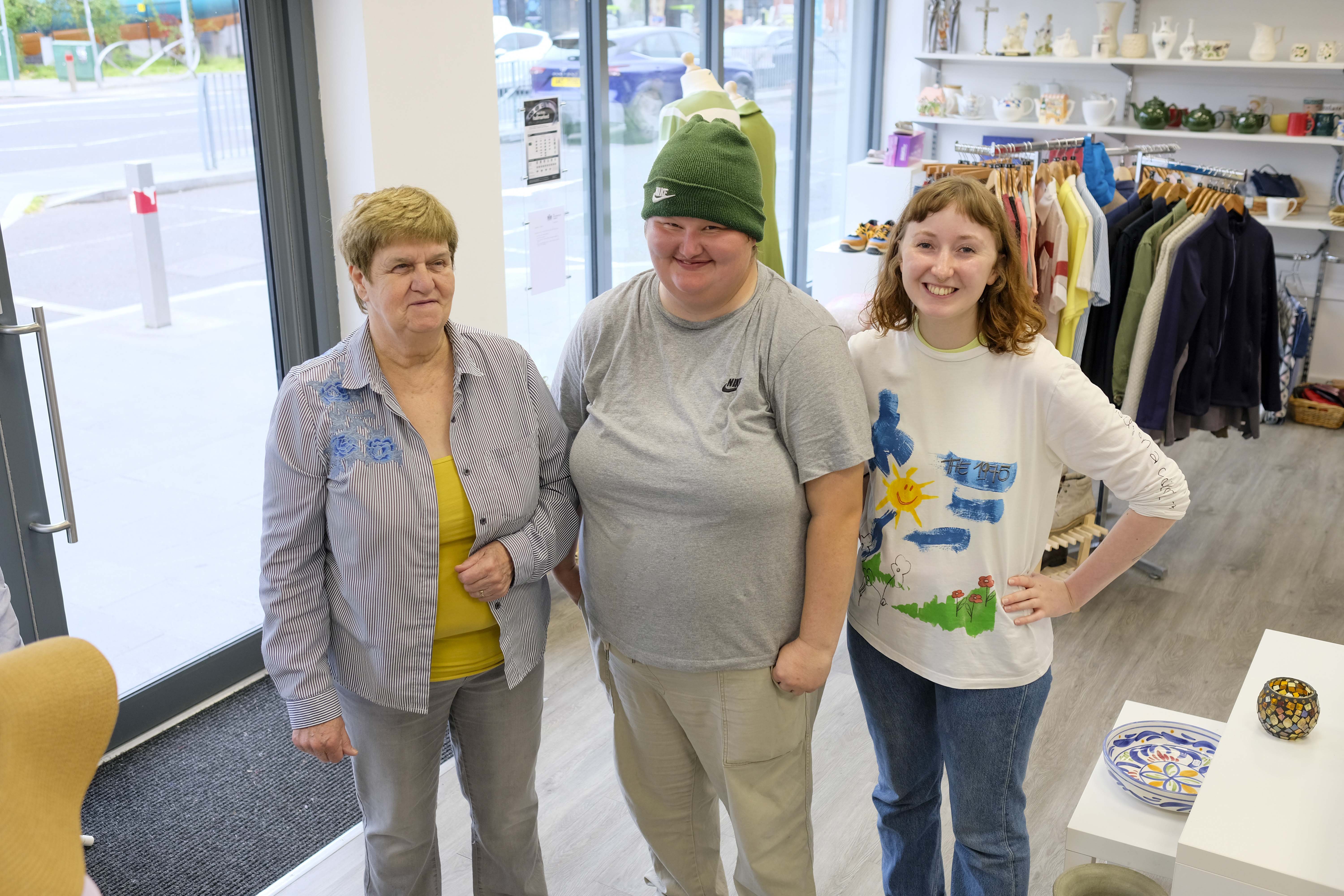 THANKS: Concern Andersonstown shop volunteers Theresa Higgins and Megan Byrne with manager Maeve Griffin