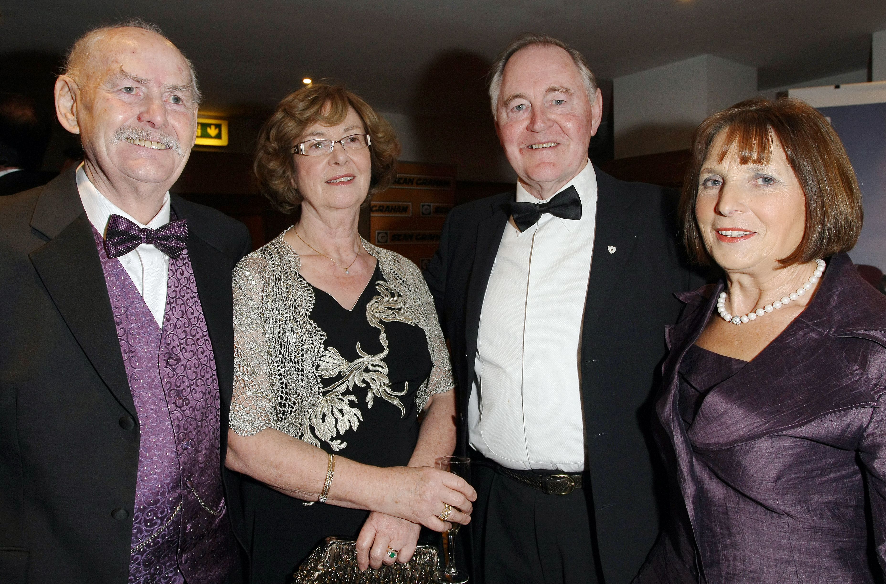LOSS: Basil and Patricia McLaughlin (left) with legendary Andersonstown News photographer Michael McCullough (RIP) and his wife Sadie at the 12th annual Aisling Awards in 2008.