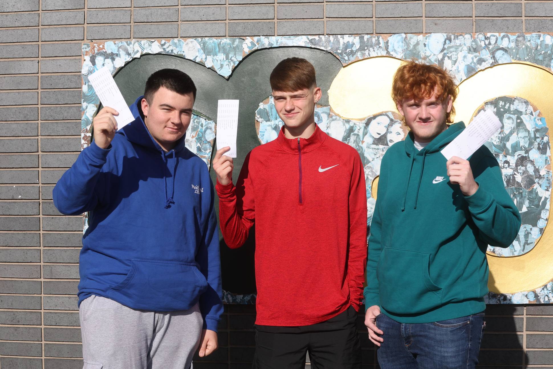 Coláiste Feirste pupils Pieras McMullan, Padraig McMaster and Gerard Byrne