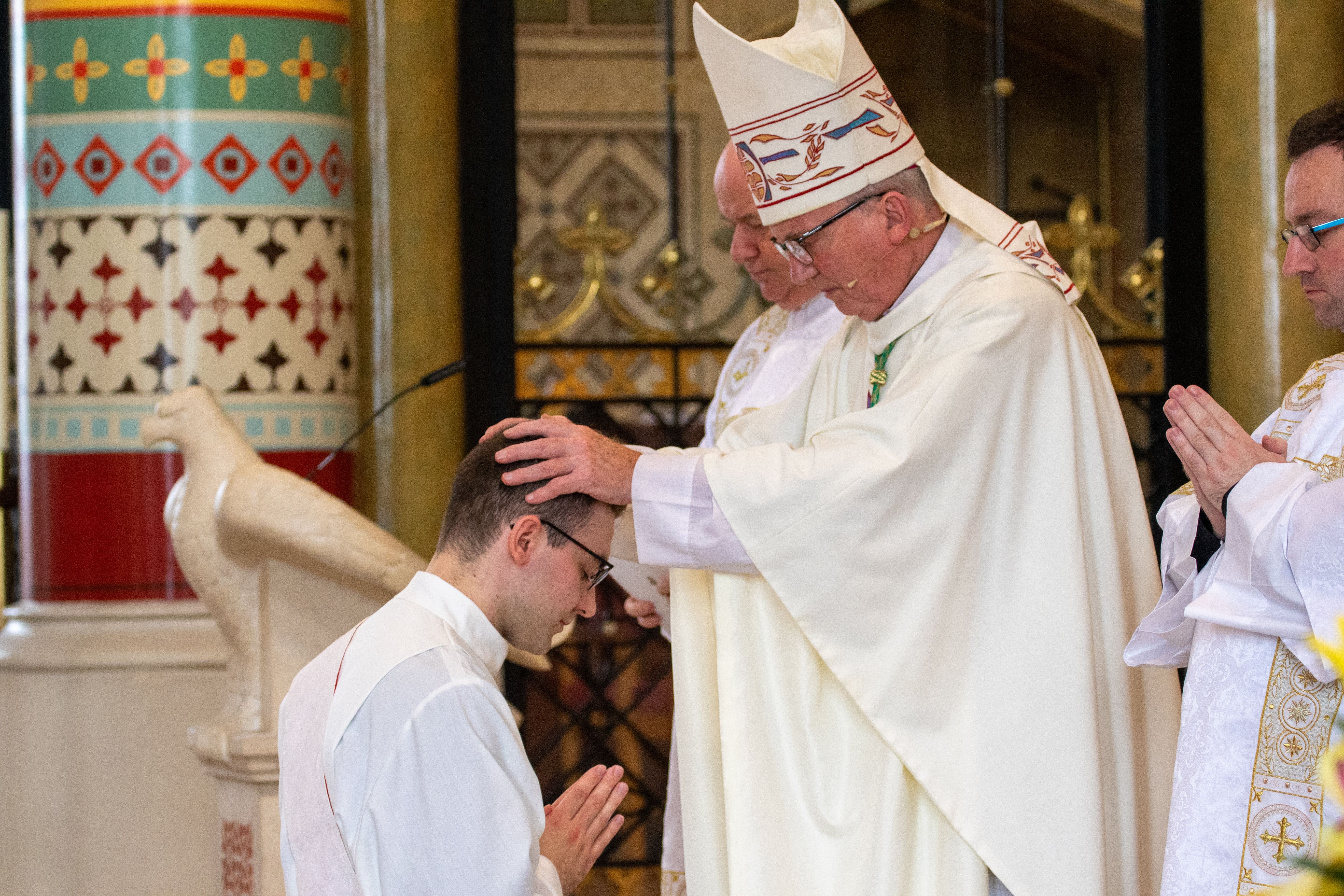 ORDINATION: Bishop Donal McKeown and Fr Dawid Aksenczuk during the laying on of hands 