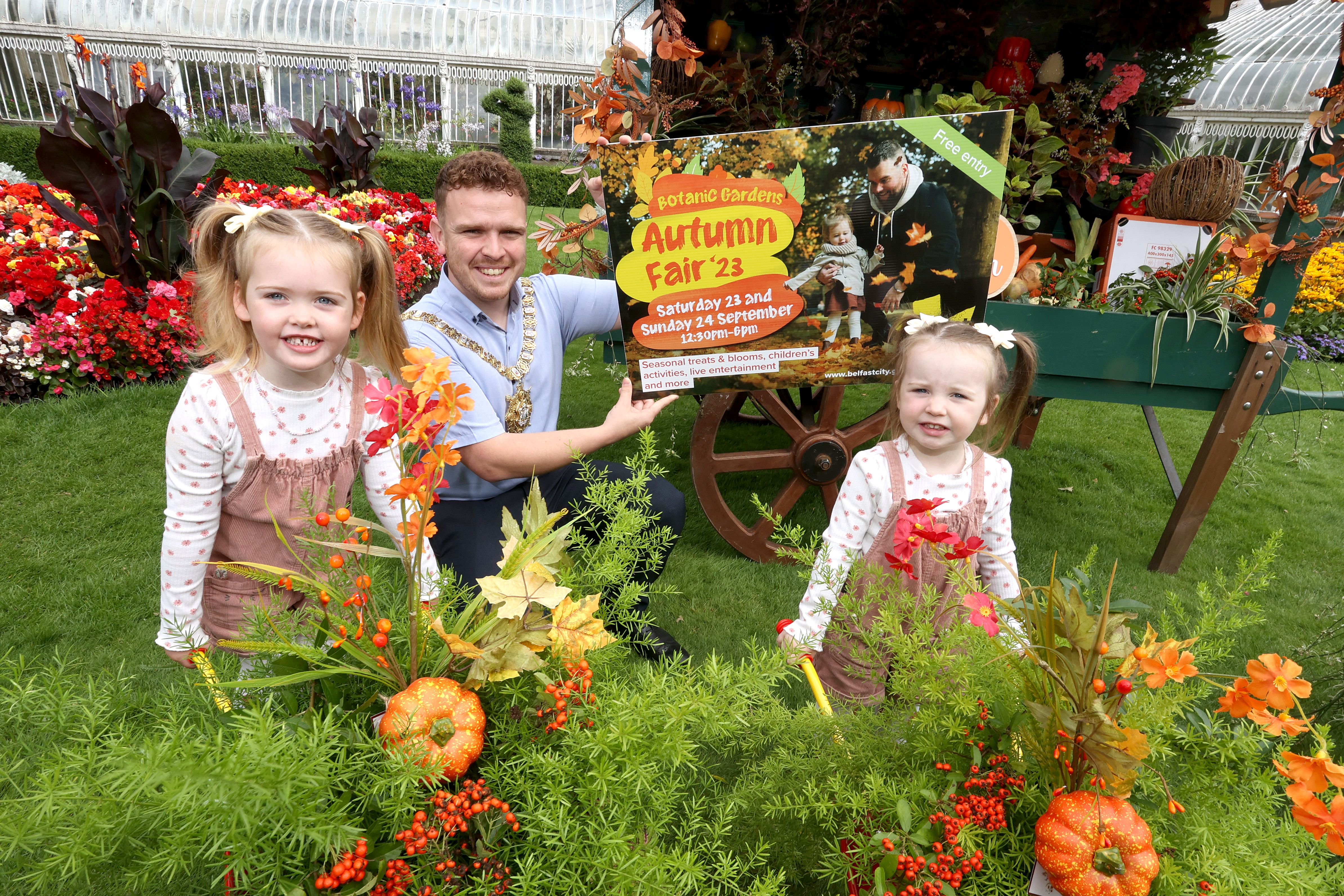 SEASON\'S CHANGE: Lord Mayor of Belfast Councillor Ryan Murphy is joined by sisters Molly and Lily Brady to launch this year’s Autumn Fair