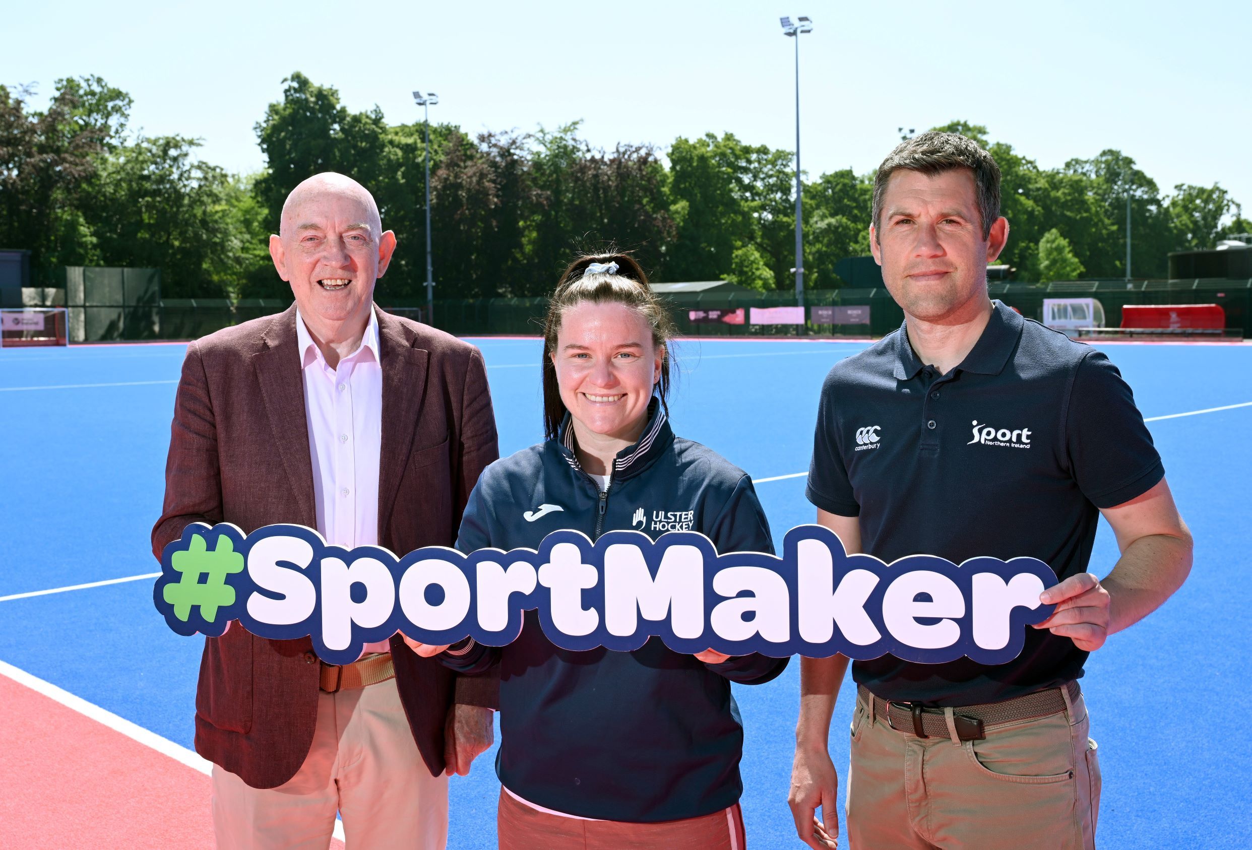 Sport NI Chair George Lucas, former Ireland Hockey International Shirley McCay and David Smyth of Sport NI’s People Development Team