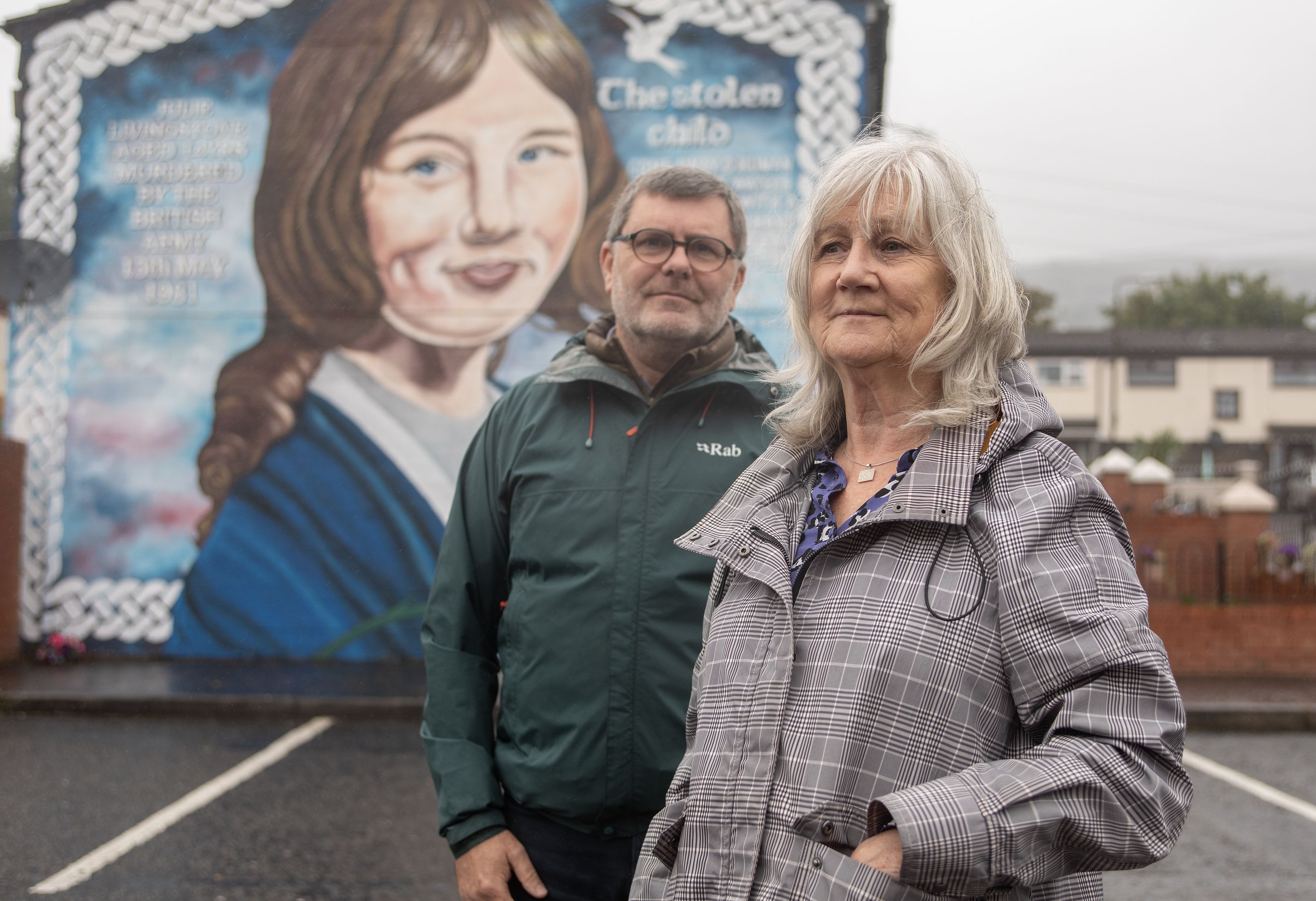 CAMPAIGN: Julie\'s sister, Elizabeth Livingstone and Mark Thompson from Relatives for Justice (RFJ) at Julie\'s mural in Lenadoon