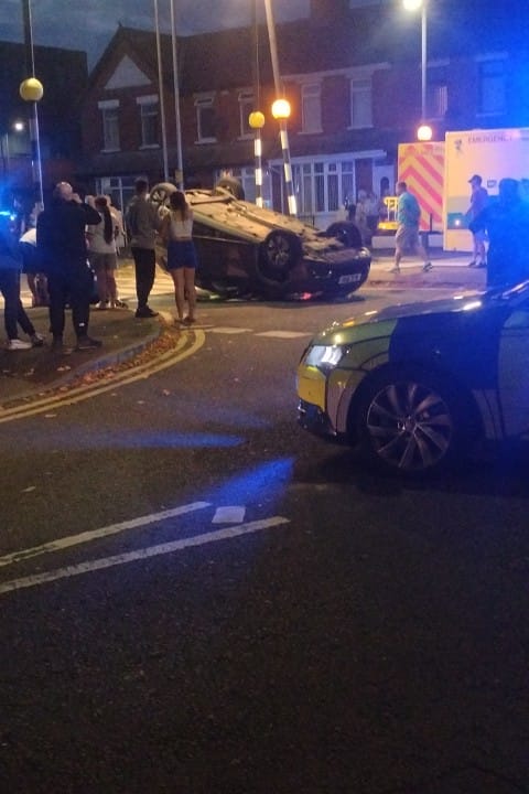 COLLISION: The overturned car at the junction with Alliance Avenue and Oldpark Road in North Belfast